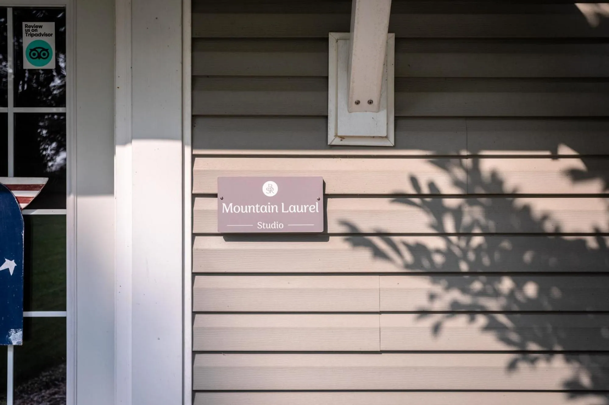 Logo/Certificate/Sign in By the Side of the Road Inn & Cottages