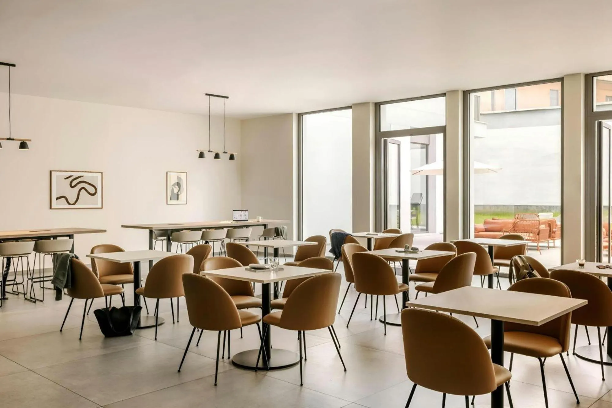 Communal lounge/ TV room in Numa Milan Montenero