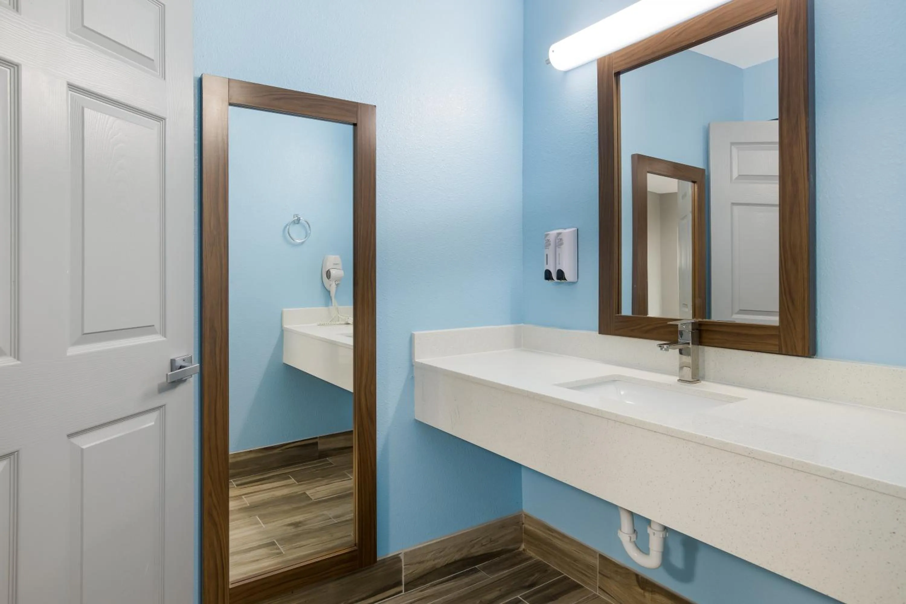 Bathroom in HomeTowne Studios by Red Roof Orange, TX