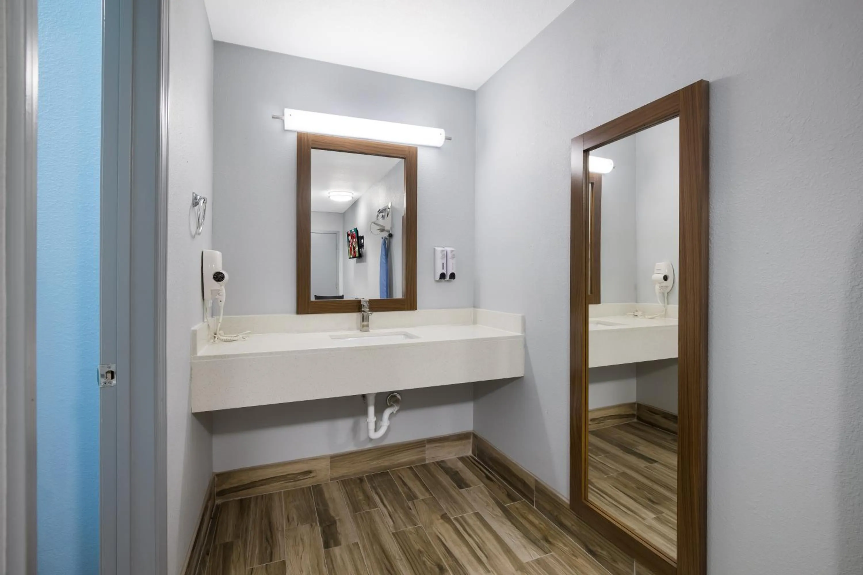 Bathroom in HomeTowne Studios by Red Roof Orange, TX