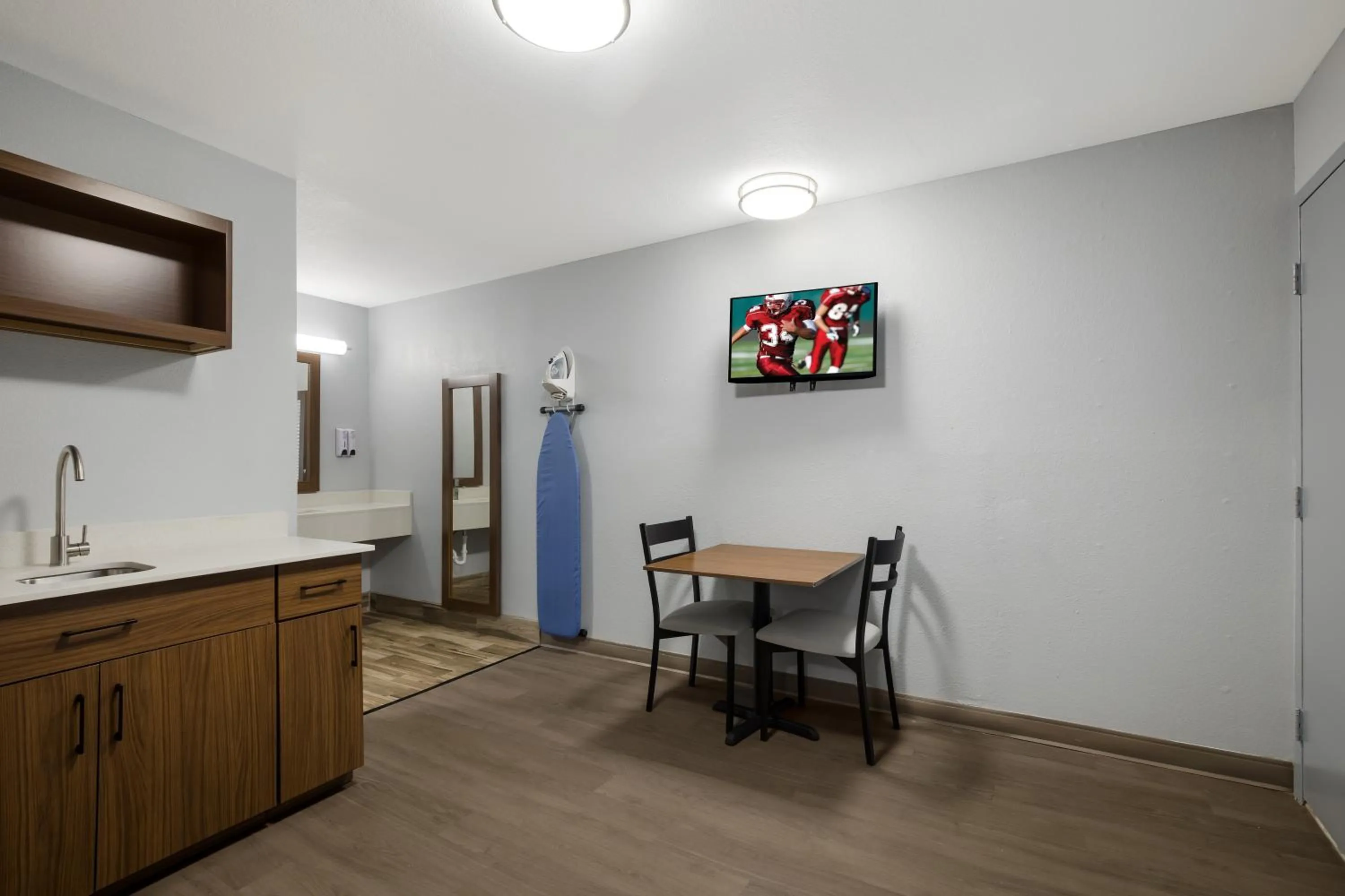 Bedroom in HomeTowne Studios by Red Roof Orange, TX