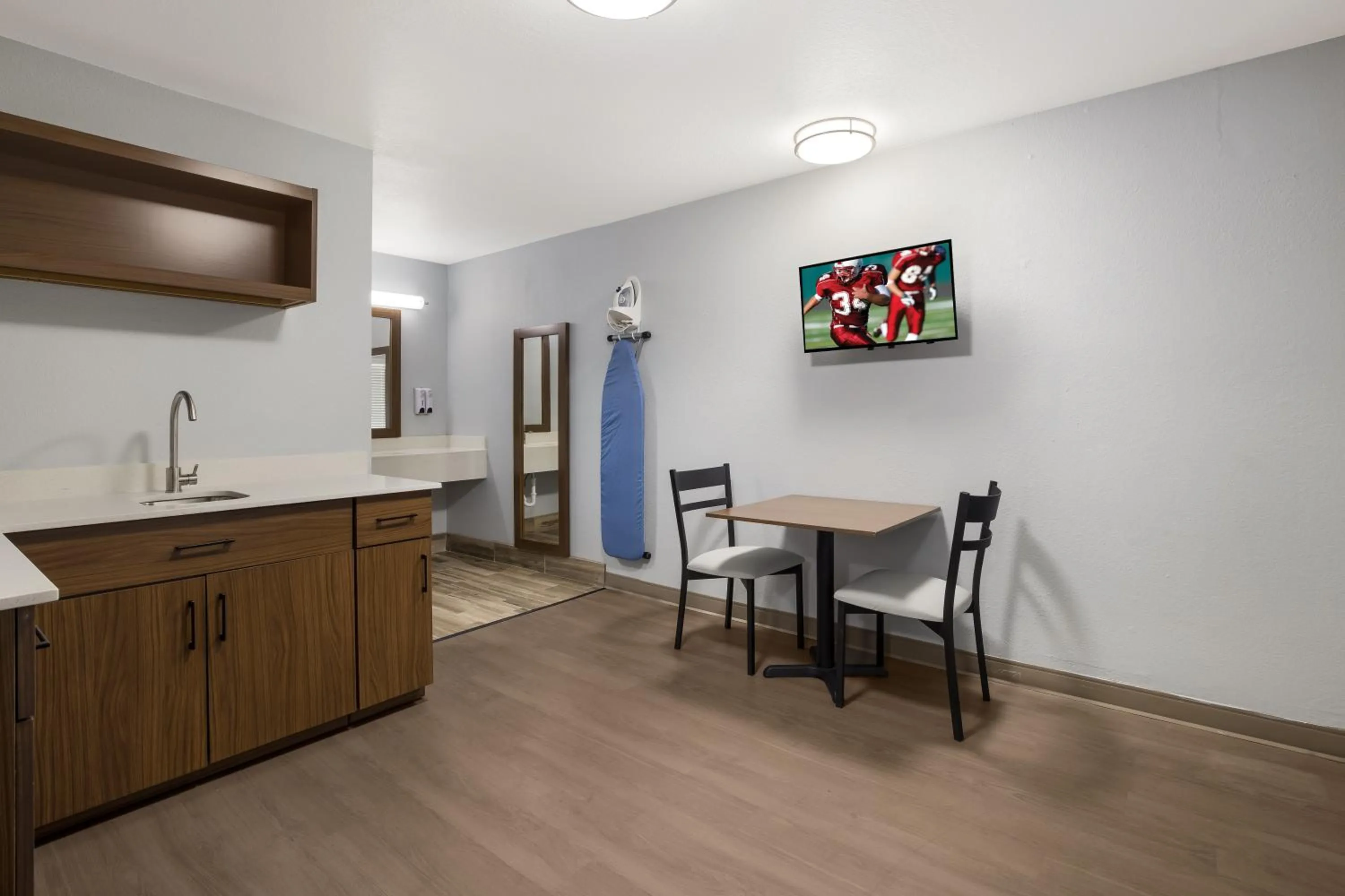 Kitchen or kitchenette in HomeTowne Studios by Red Roof Orange, TX