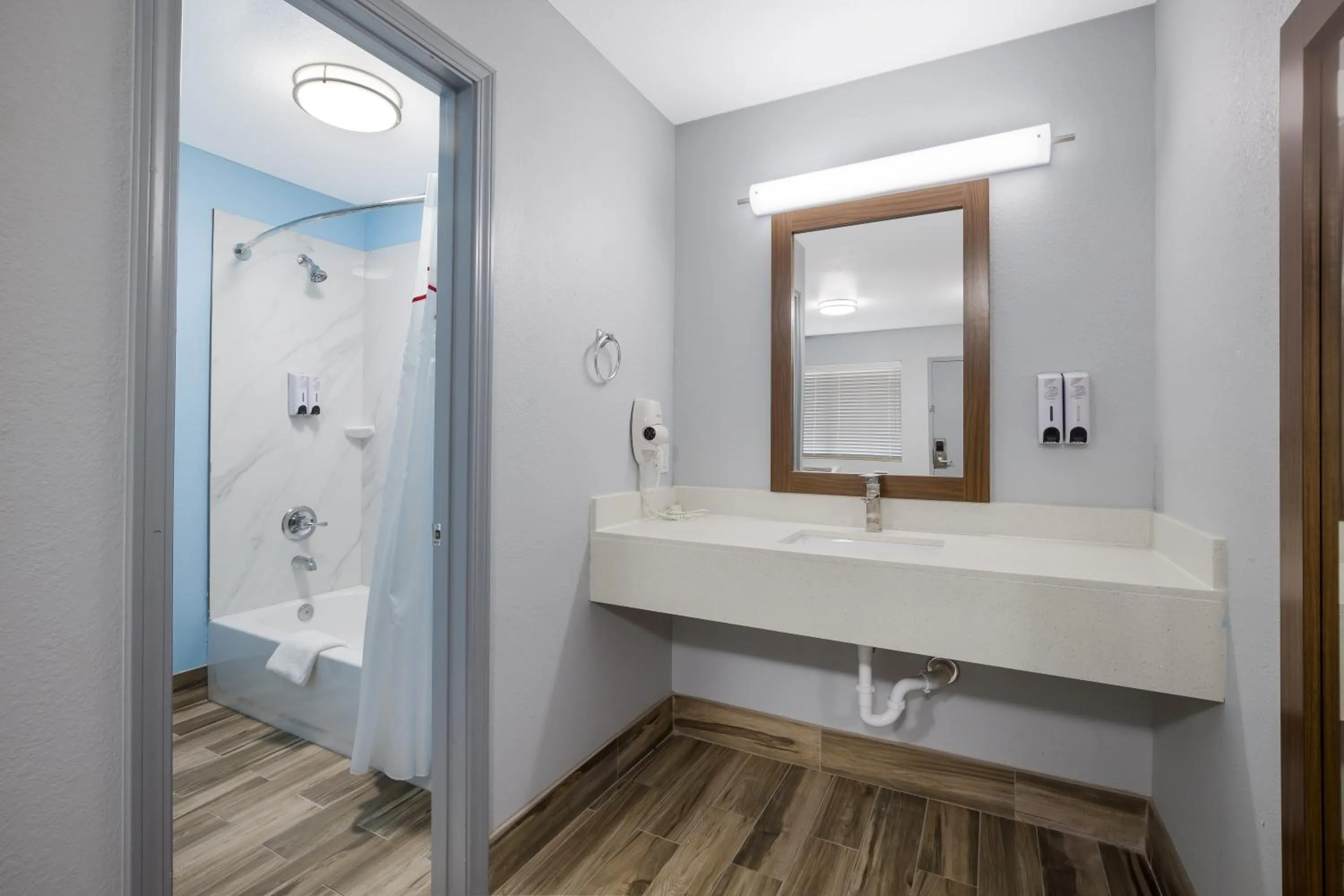 Bathroom in HomeTowne Studios by Red Roof Orange, TX