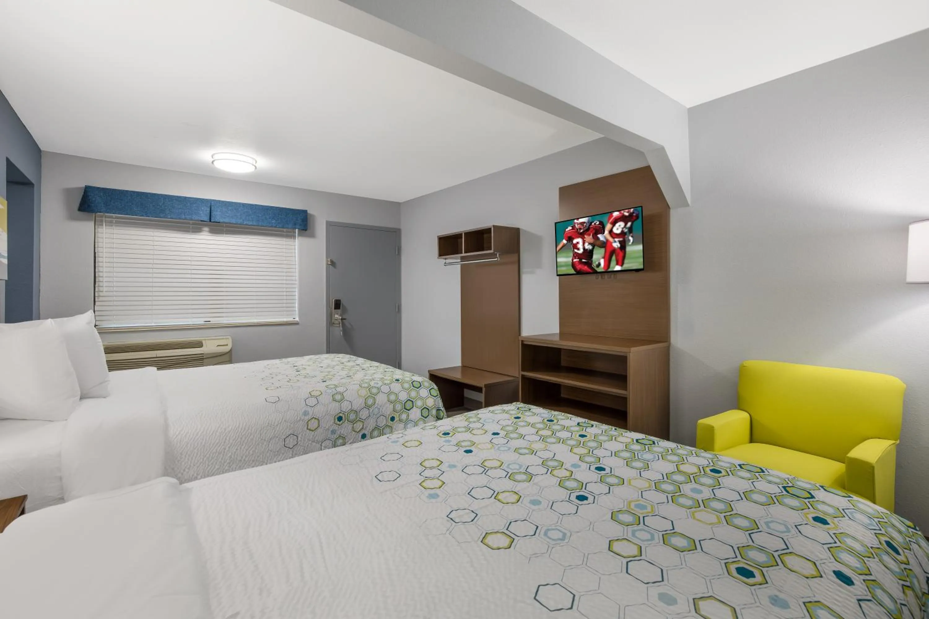 Bedroom, Bed in HomeTowne Studios by Red Roof Orange, TX