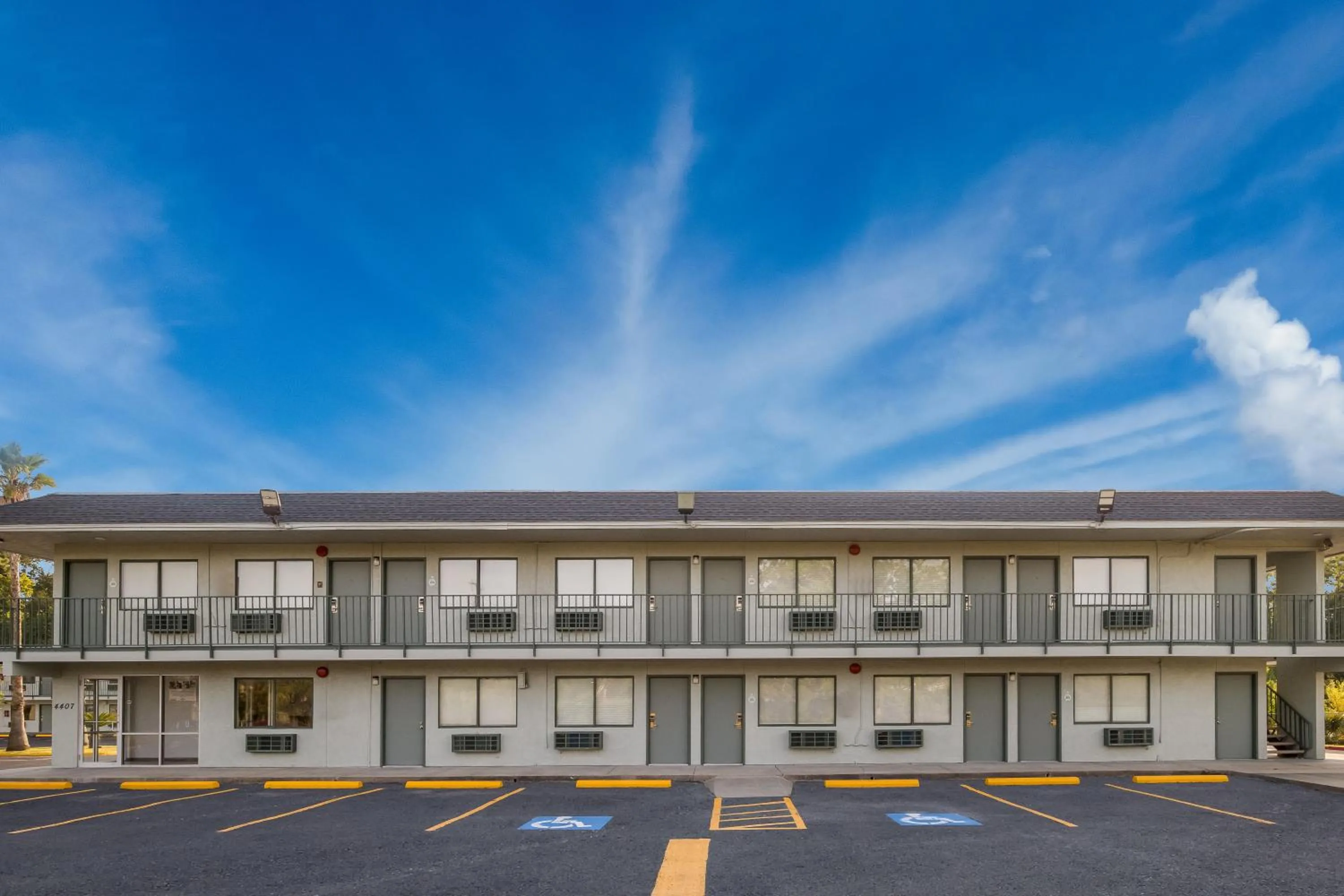 Property building in HomeTowne Studios by Red Roof Orange, TX