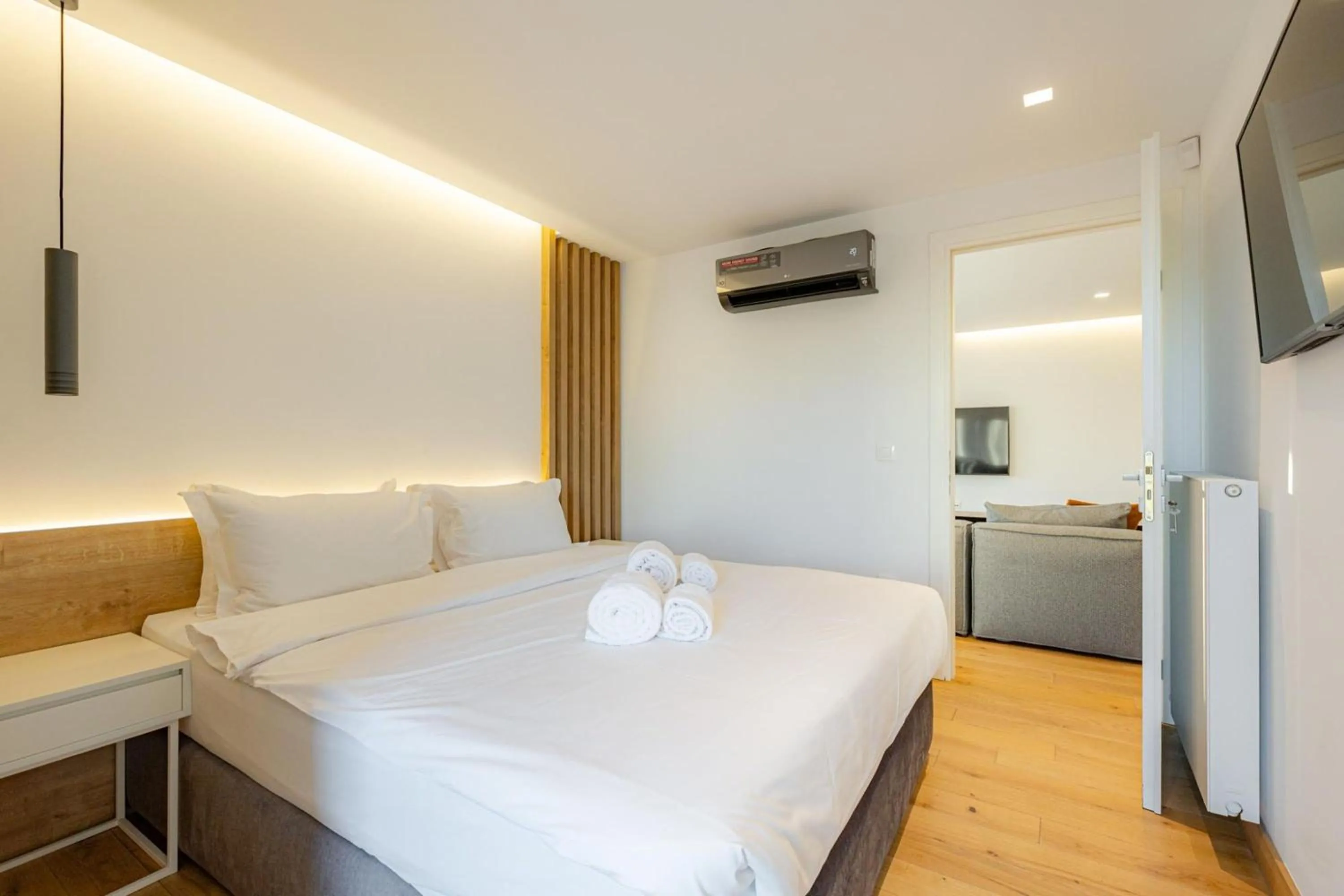 Bedroom in Earth Boutique Apartments next to Stavros Niarchos