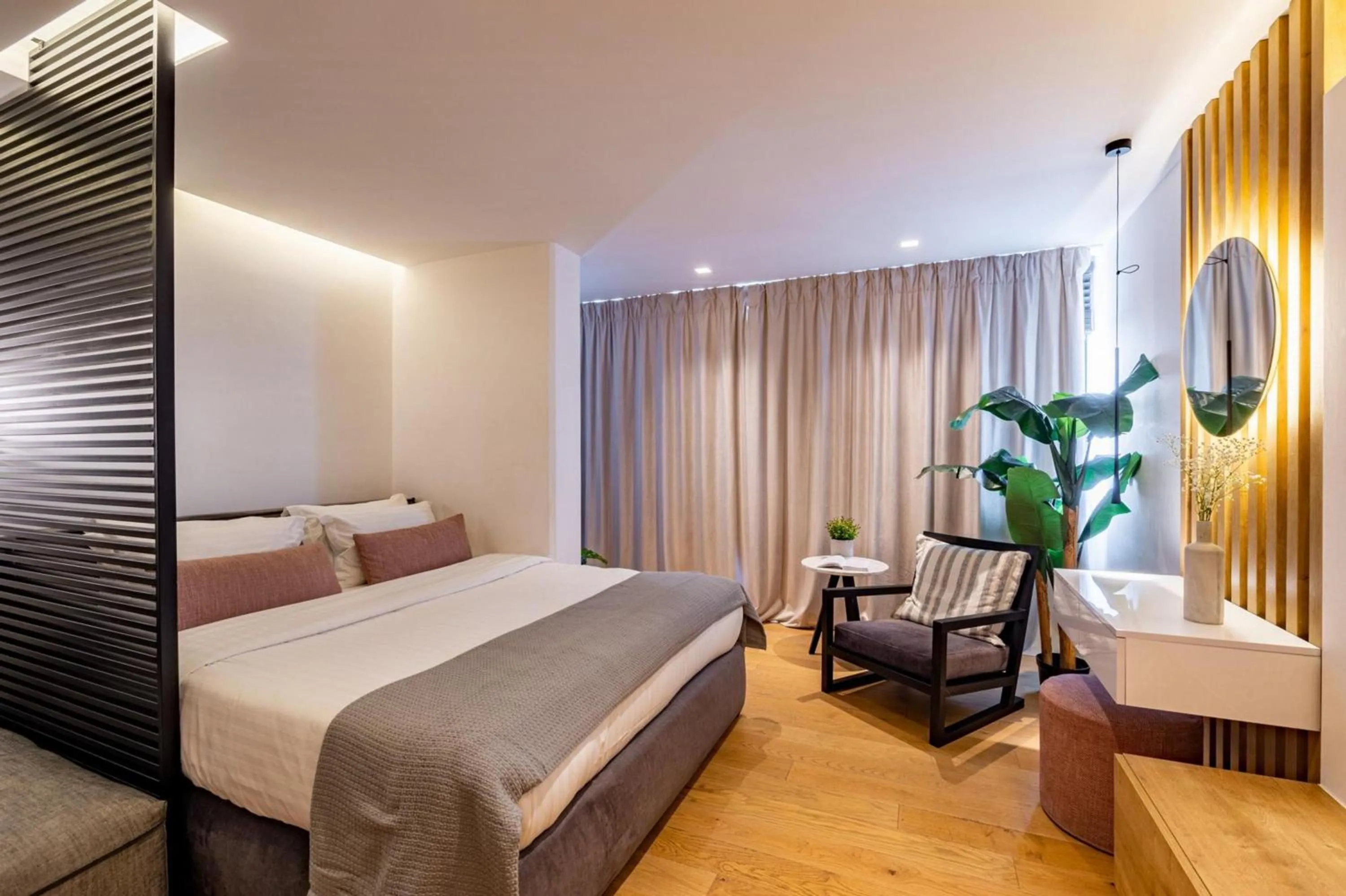 Bedroom in Earth Boutique Apartments next to Stavros Niarchos