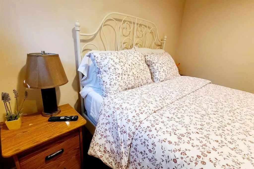 Bed in Spacious and bright unit with natural light.