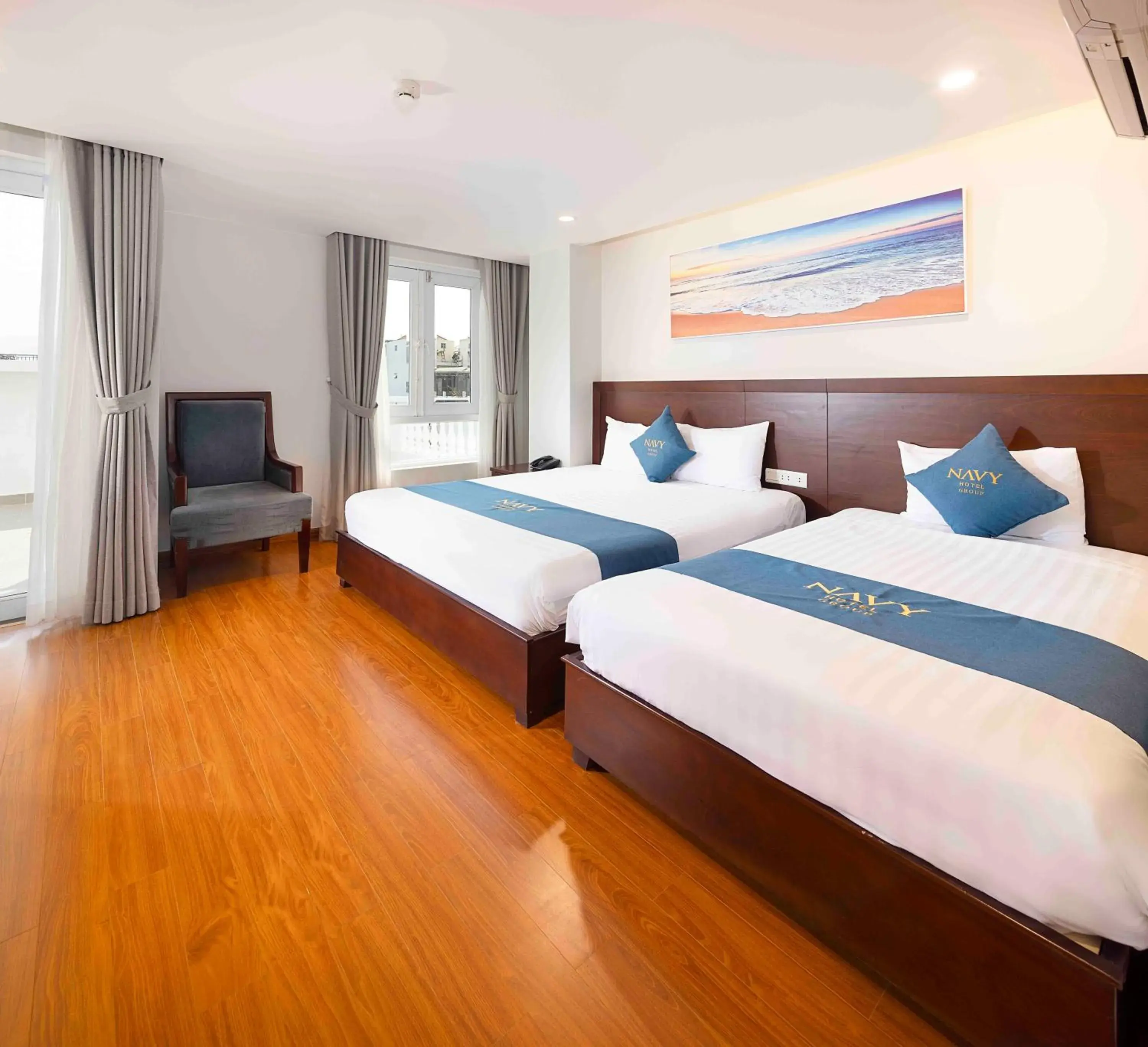 Deluxe Triple Room with Balcony in Navy Hotel Nha Trang Deluxe Triple Room with Balcony in Navy Hotel Nha Trang