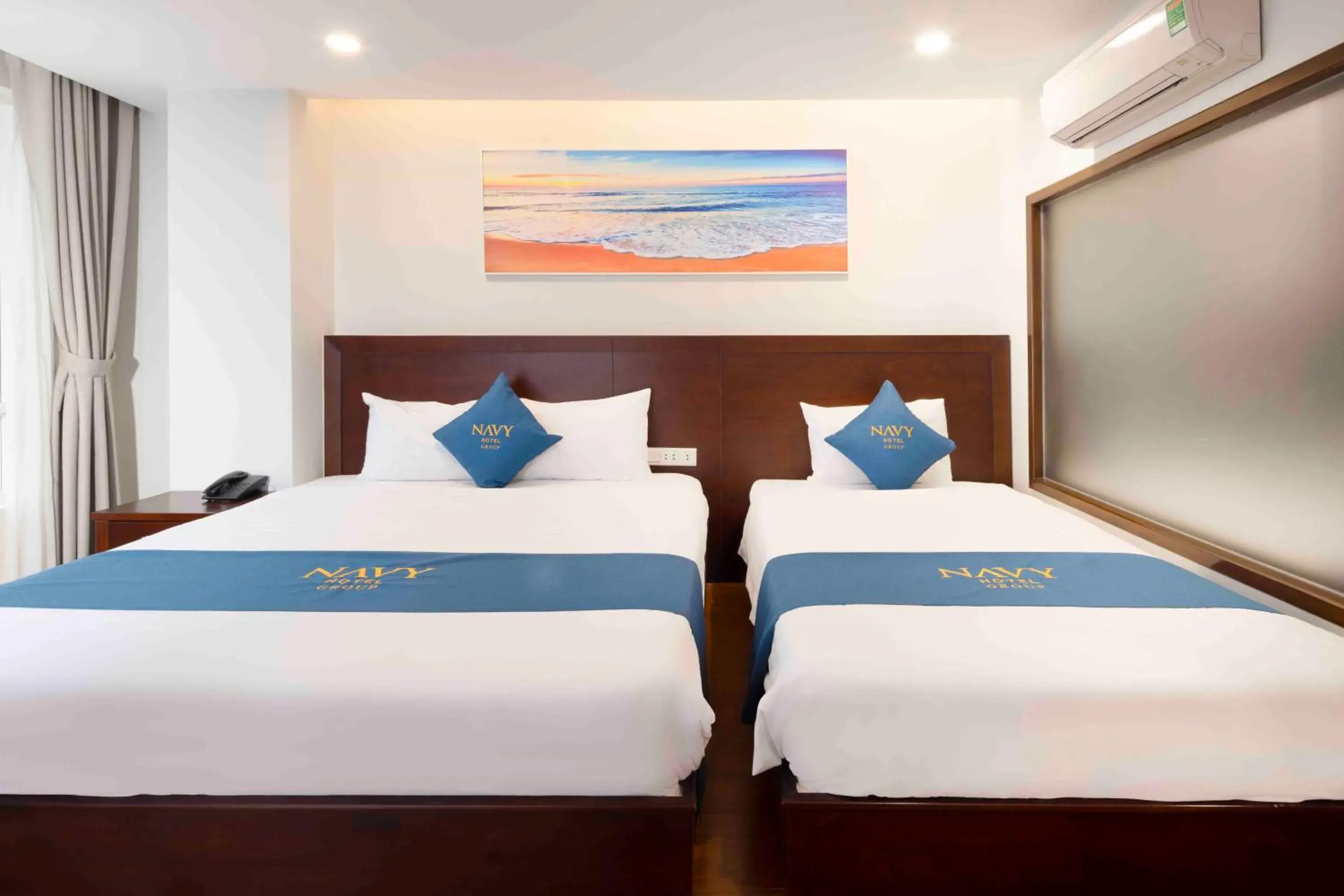 Deluxe Triple Room with Balcony in Navy Hotel Nha Trang Deluxe Triple Room with Balcony in Navy Hotel Nha Trang