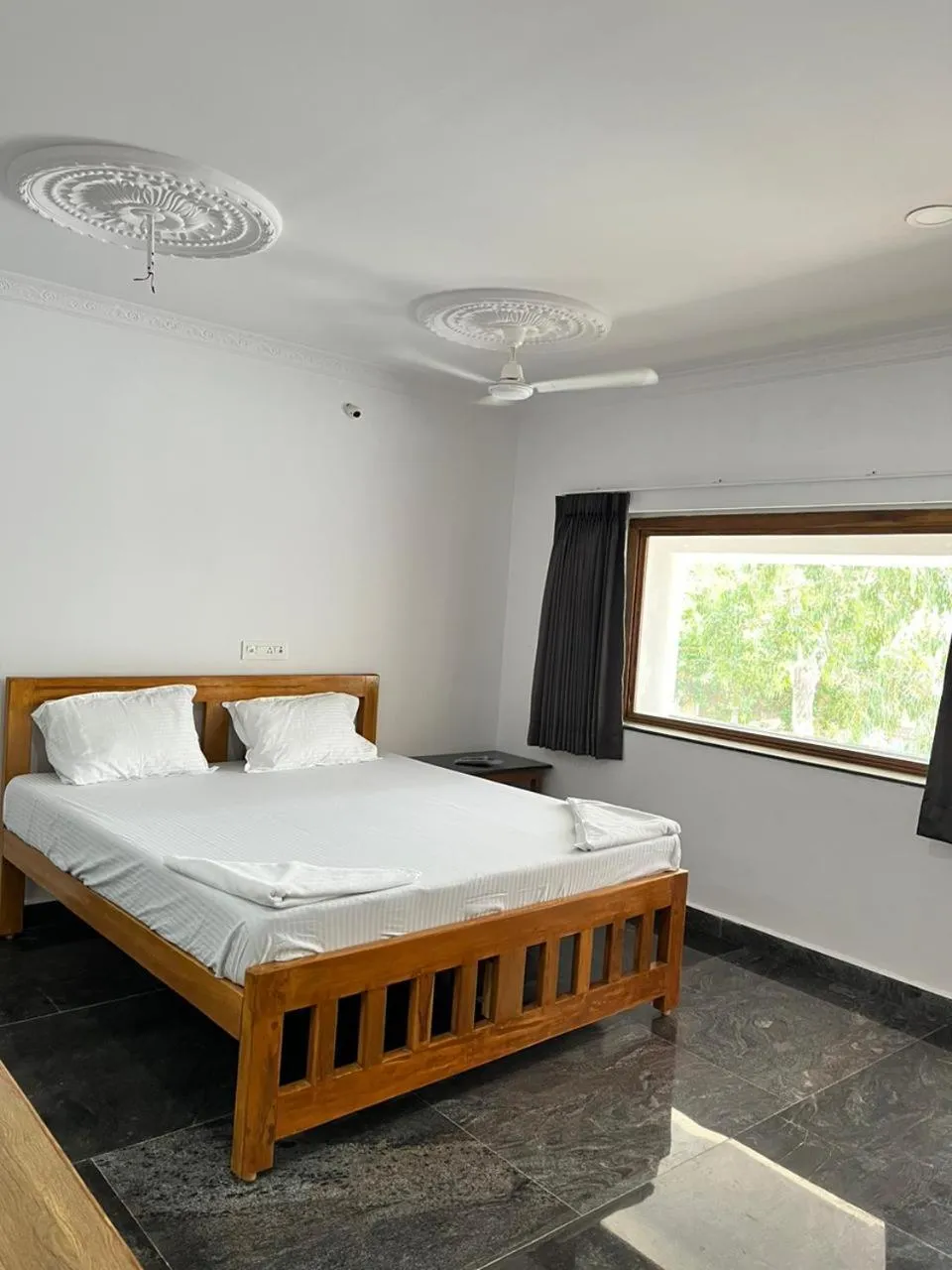 Bed in ANAND Beach Guesthouse by Moonrocks