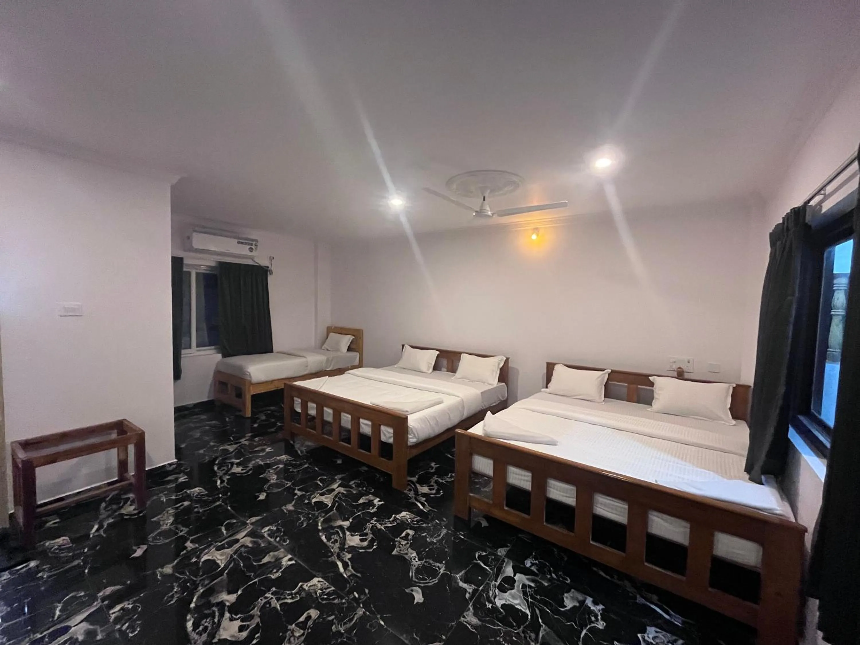 Bed in ANAND Beach Guesthouse by Moonrocks