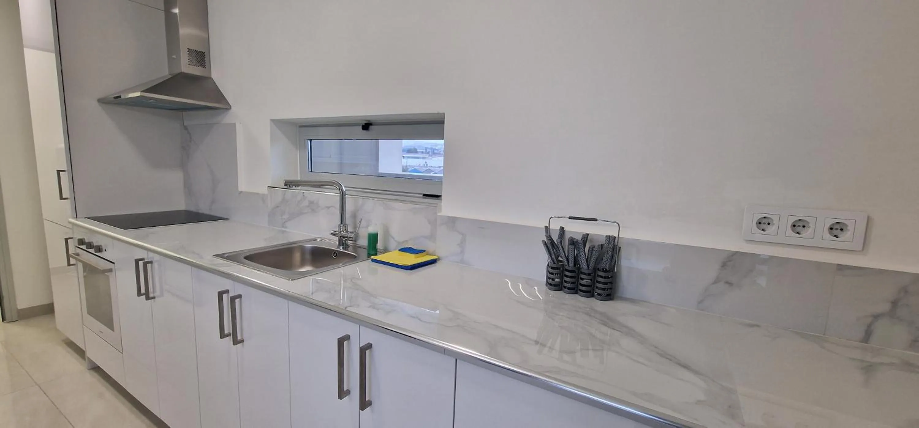 Kitchen or kitchenette in APARTAMENTOS OASIS DE LA CALA