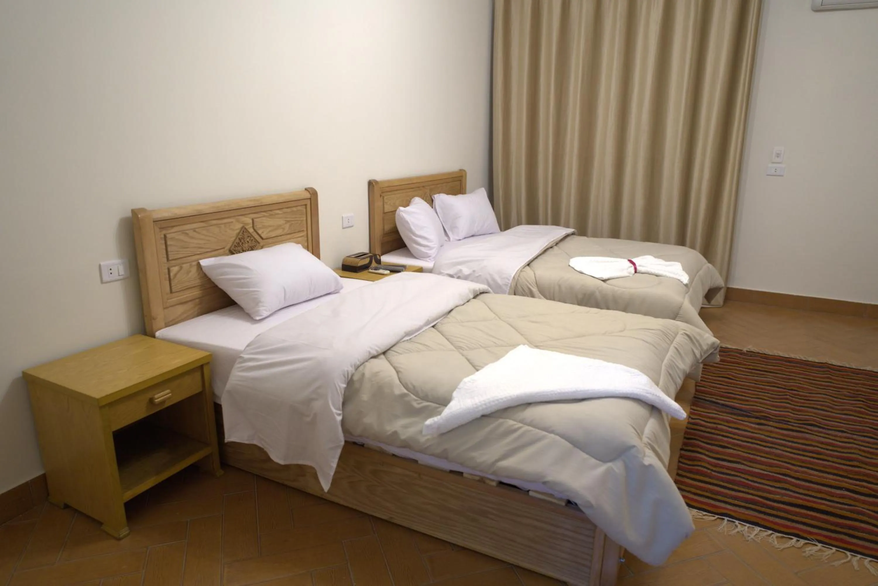 Bed in Central Cairo Hotel