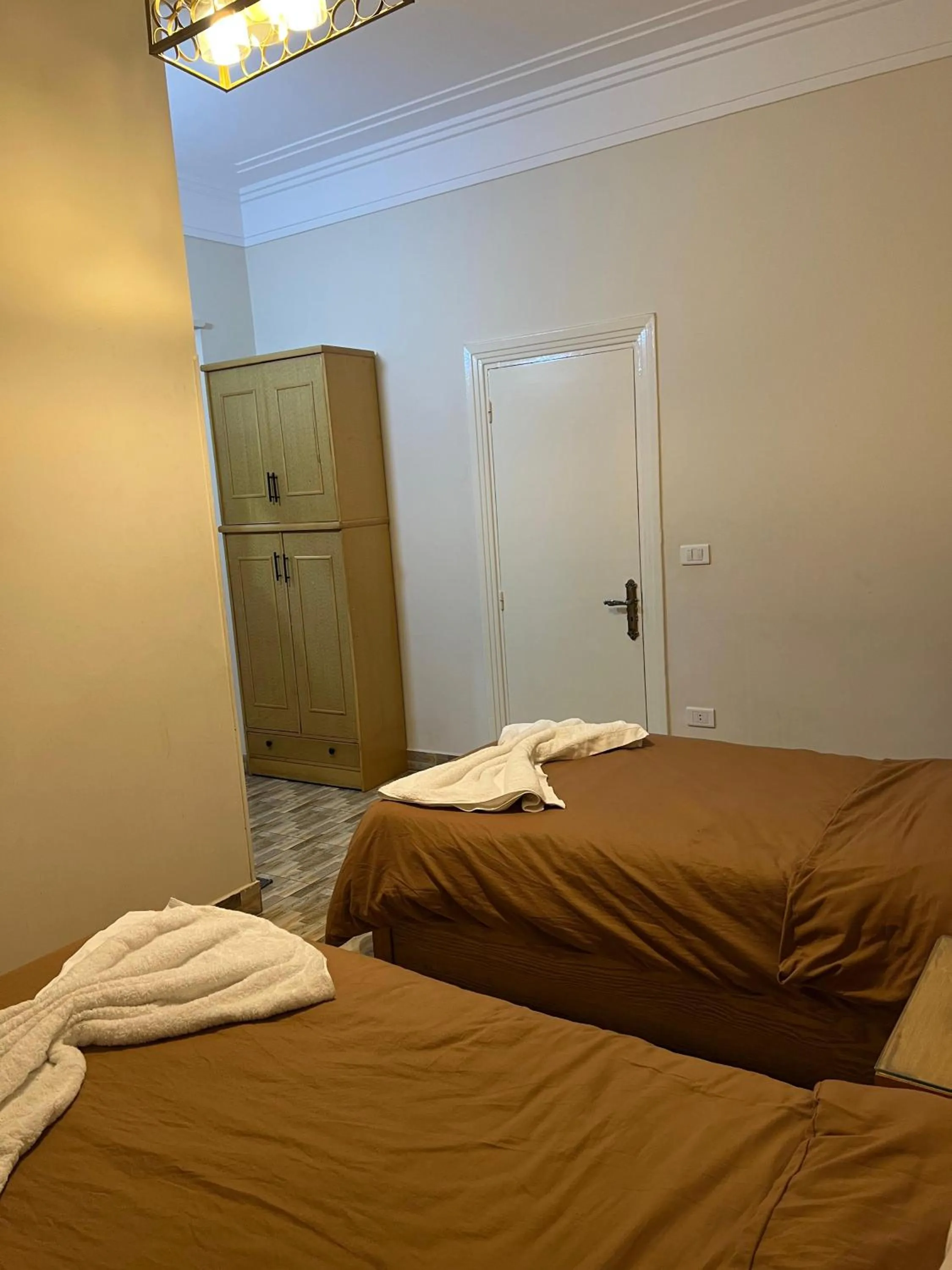 Photo of the whole room, Bed in Central Cairo Hotel