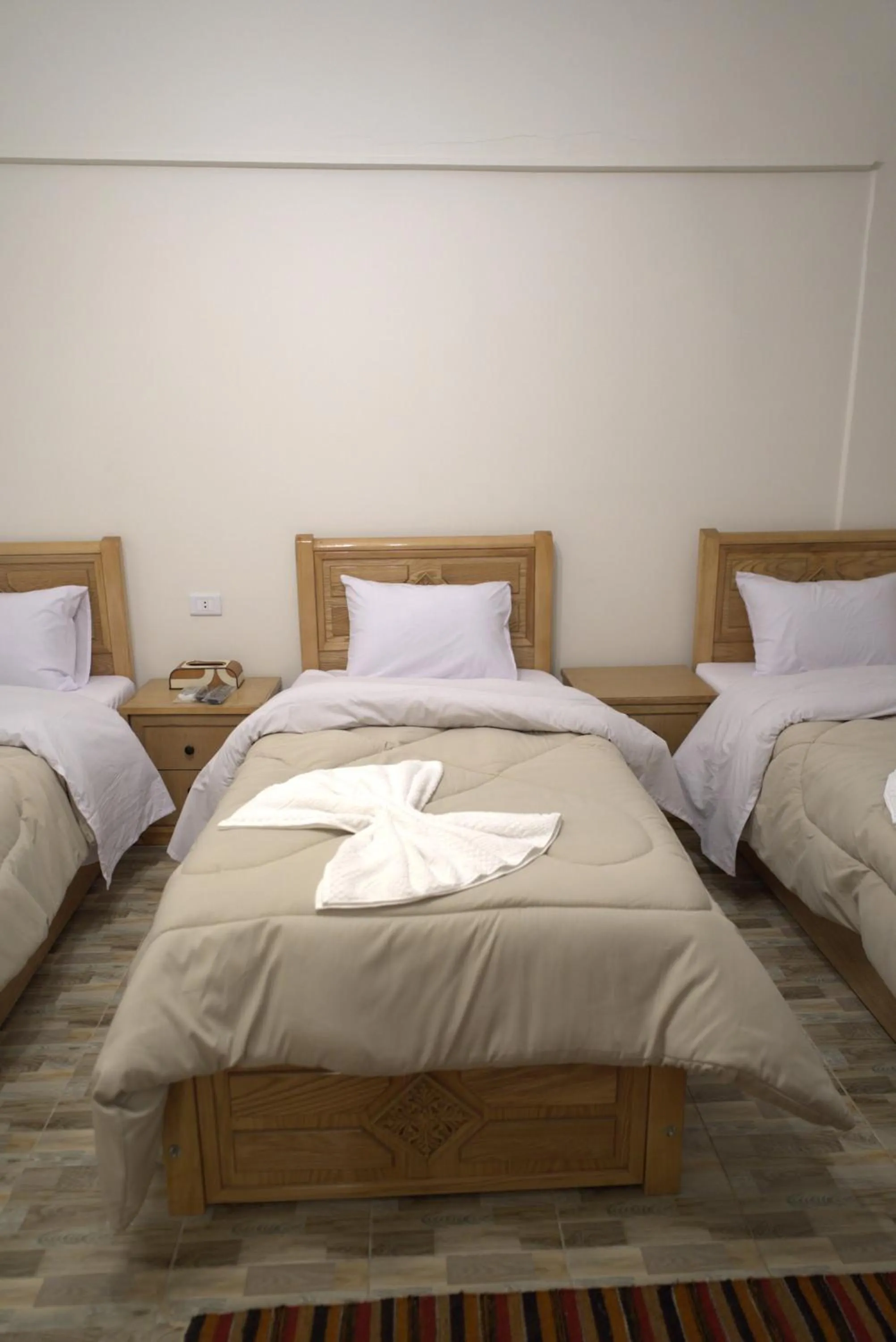 Bed in Central Cairo Hotel