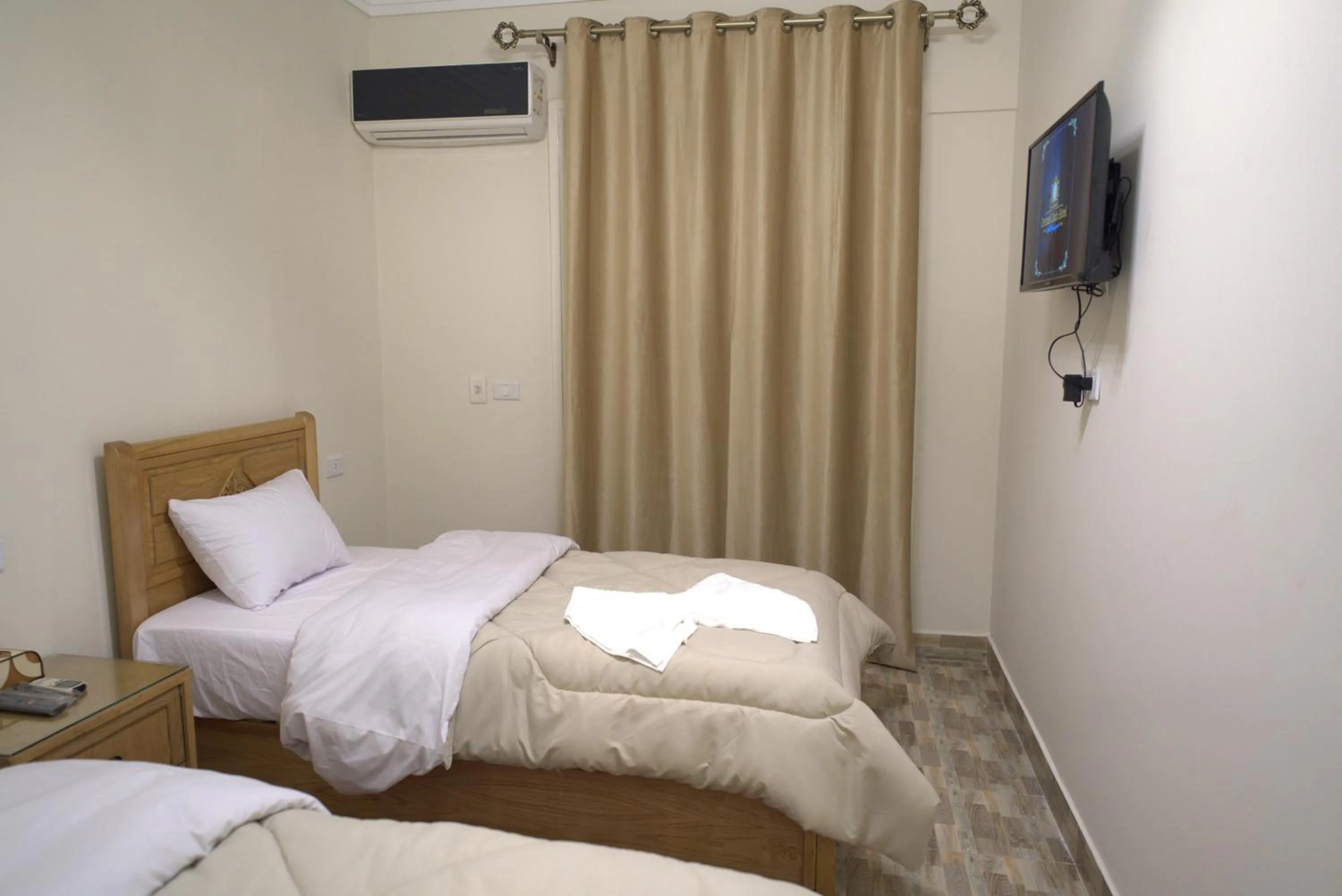 Bed in Central Cairo Hotel