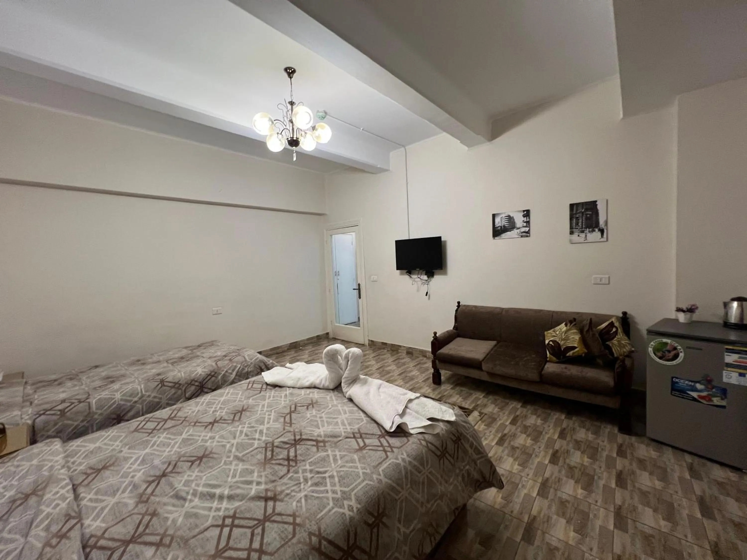 Photo of the whole room, Bed in Central Cairo Hotel