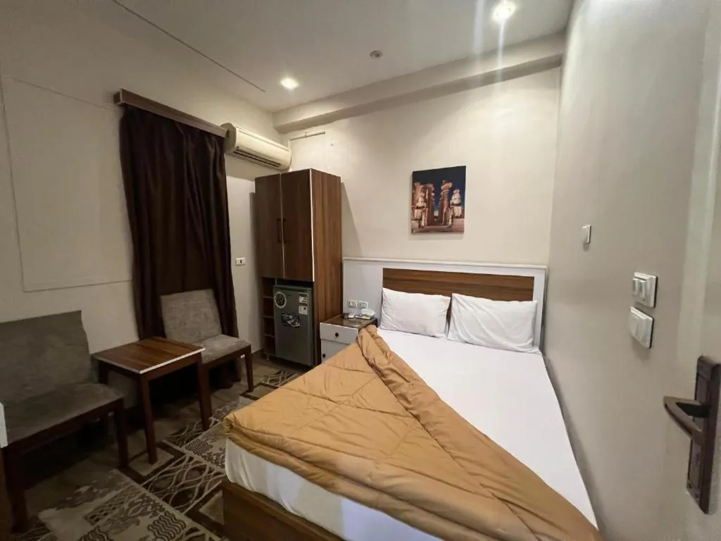 Bed in Central Cairo Hotel