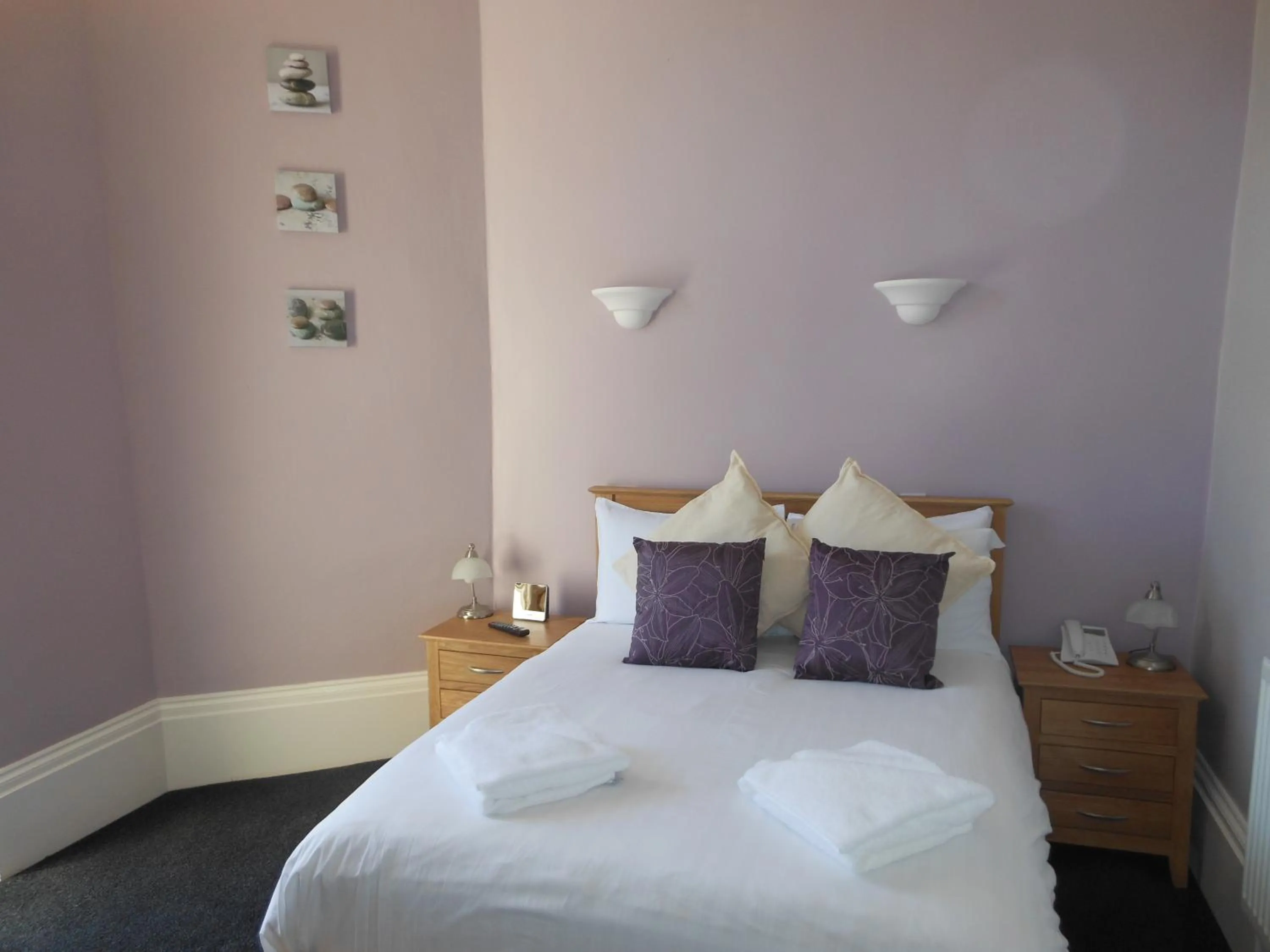 Bed in Bath House Hotel