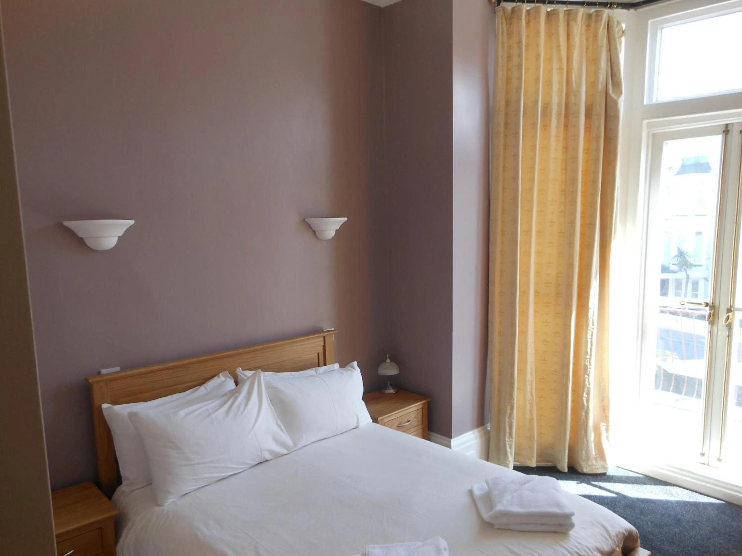 Bed in Bath House Hotel