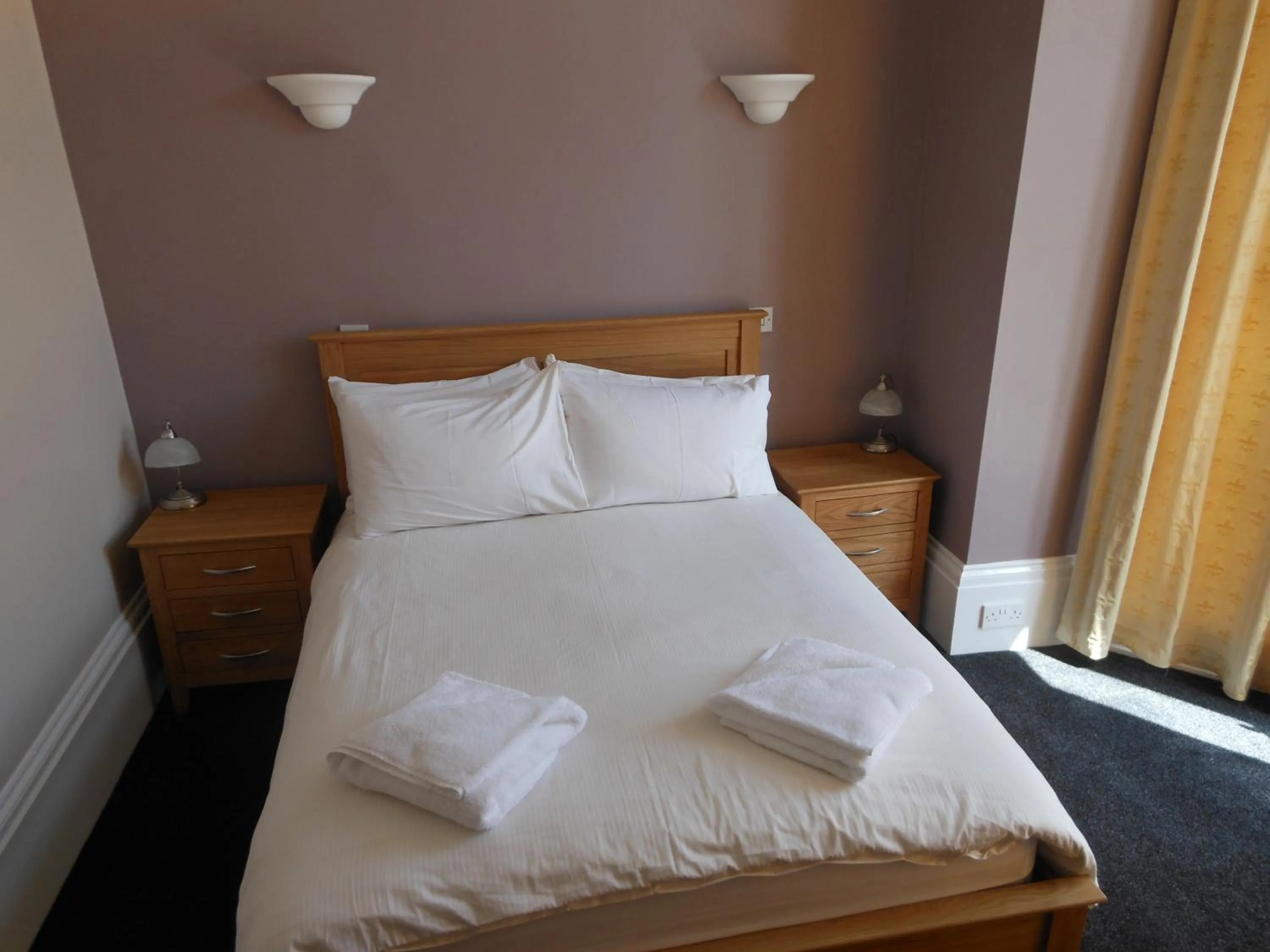 Bed in Bath House Hotel