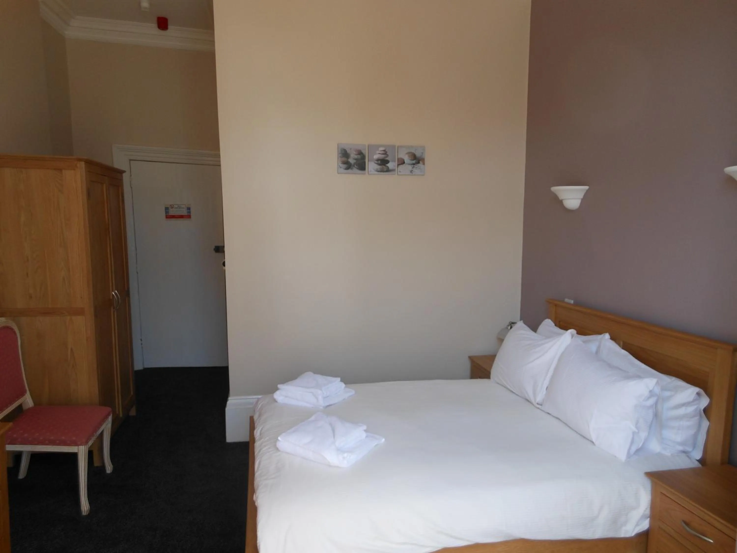 Bed in Bath House Hotel