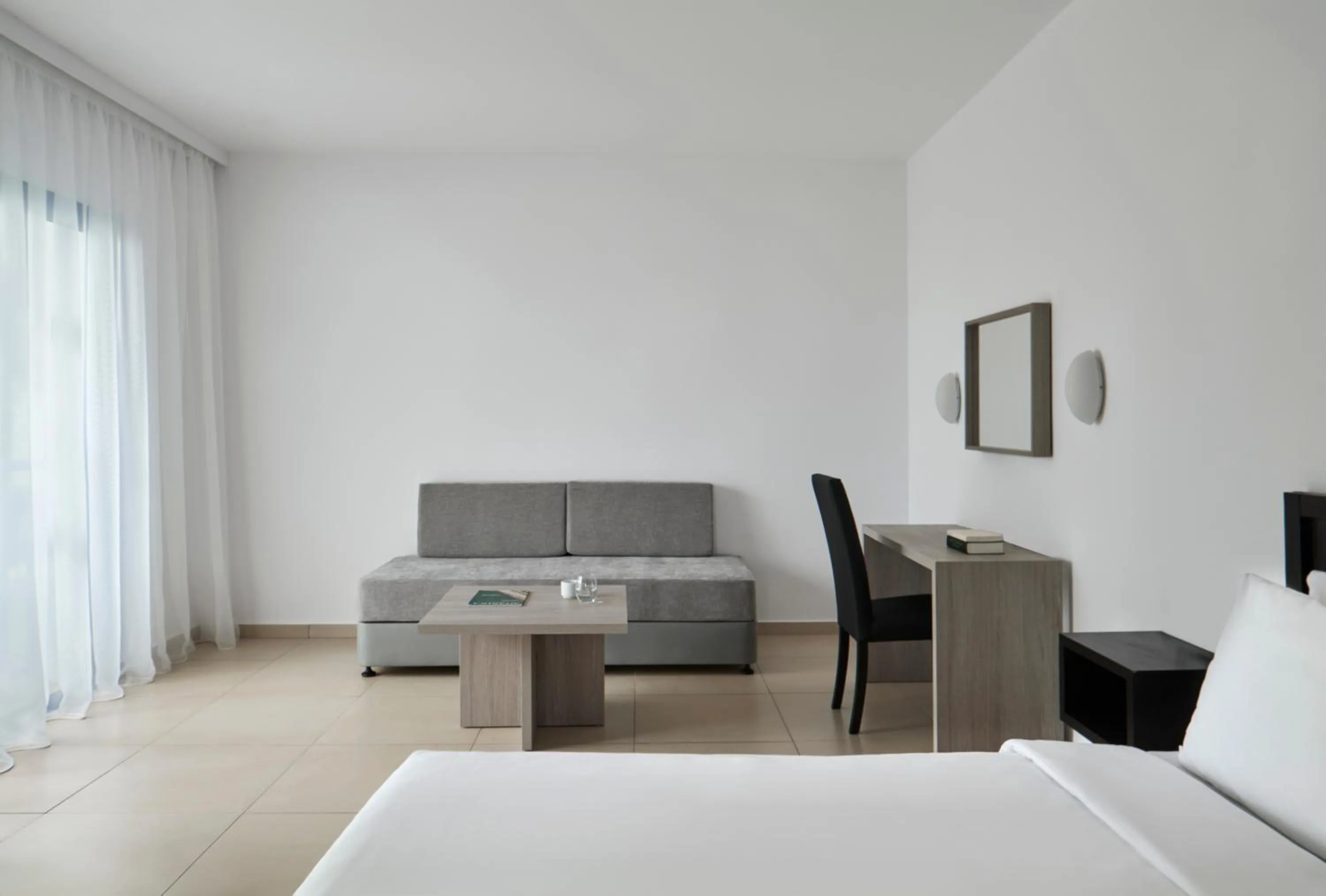 Living room, Bed in Atlantica Callisto