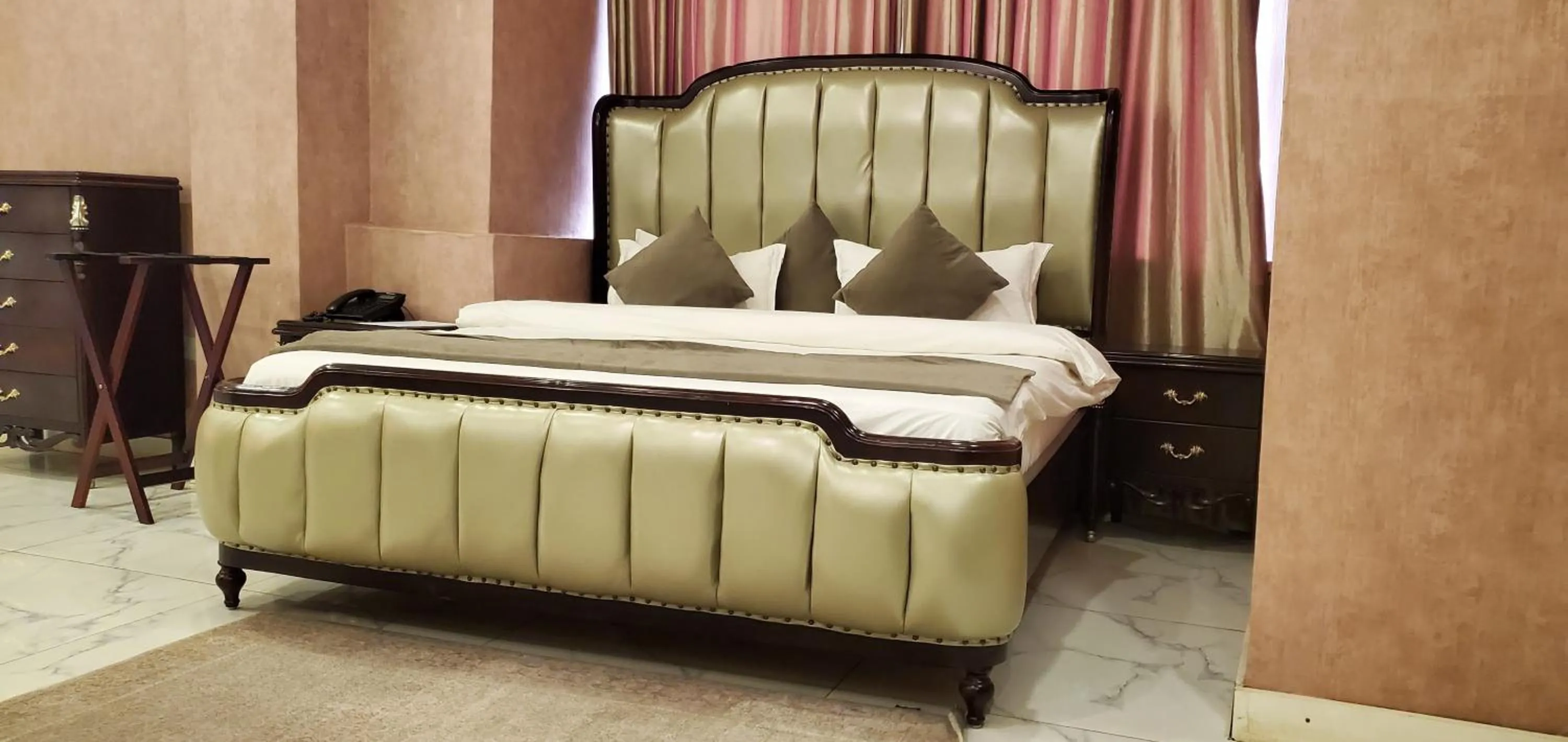 Bed in The Palms Hotel