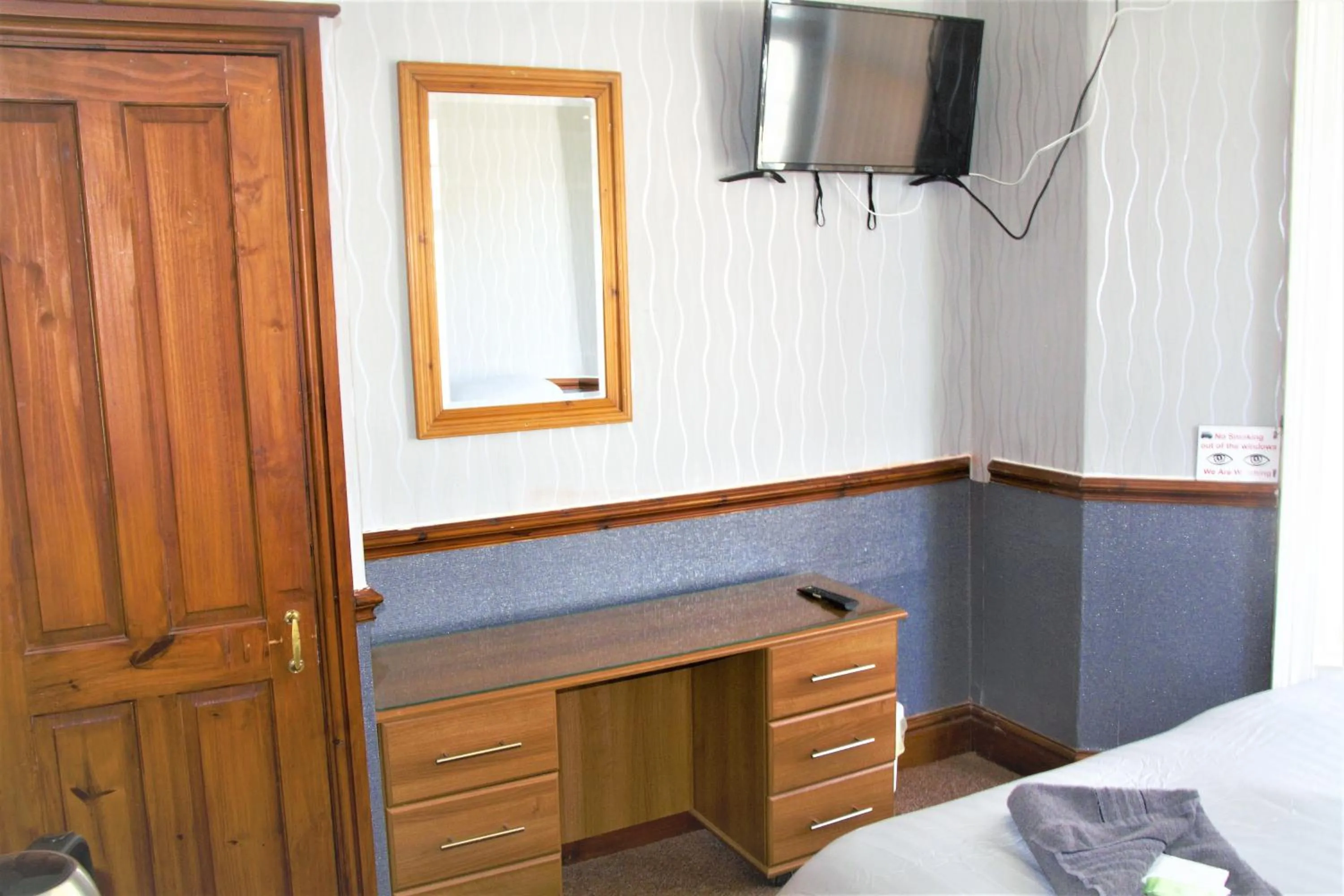 Bed in Pine Lodge Hotel