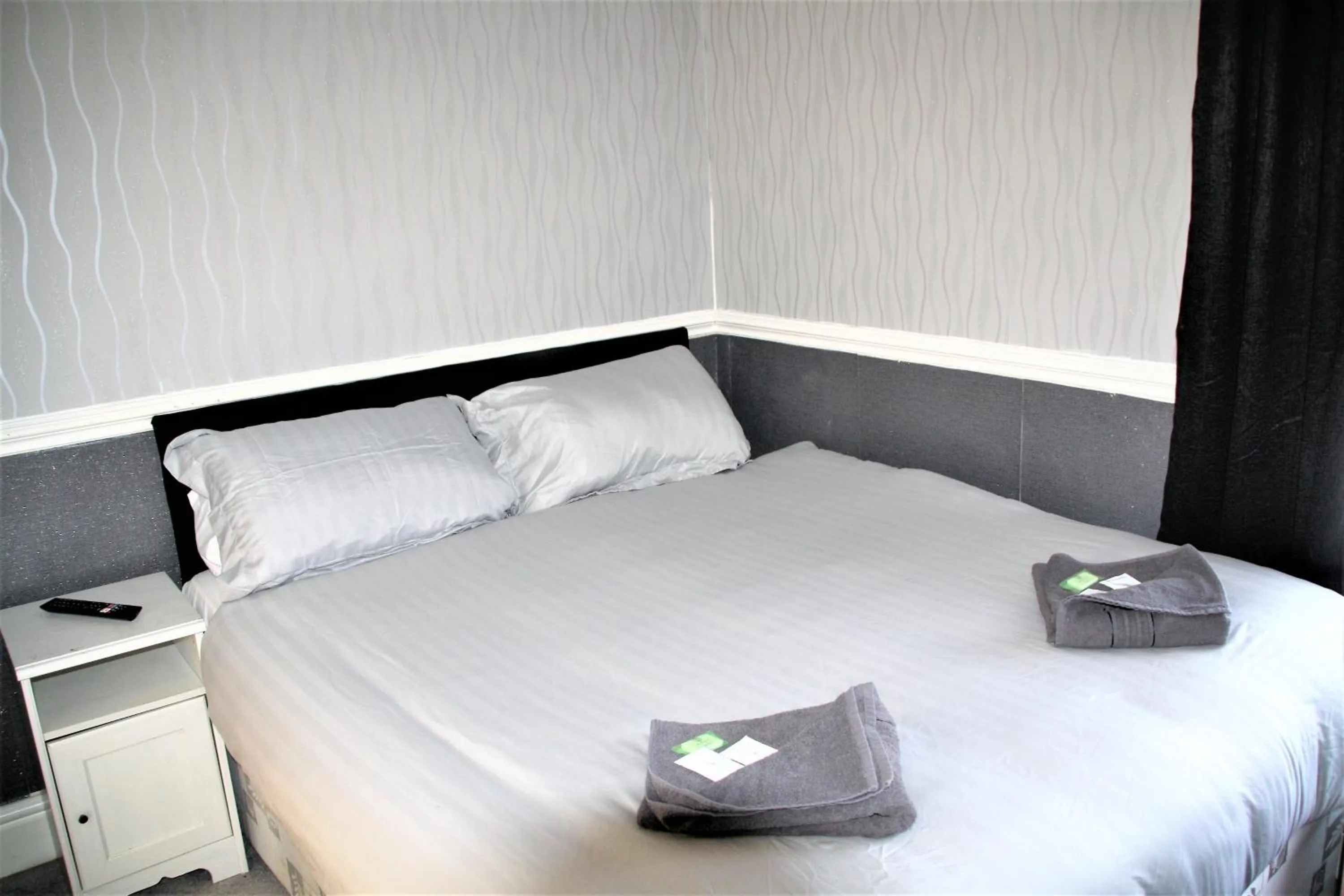 Bed in Pine Lodge Hotel