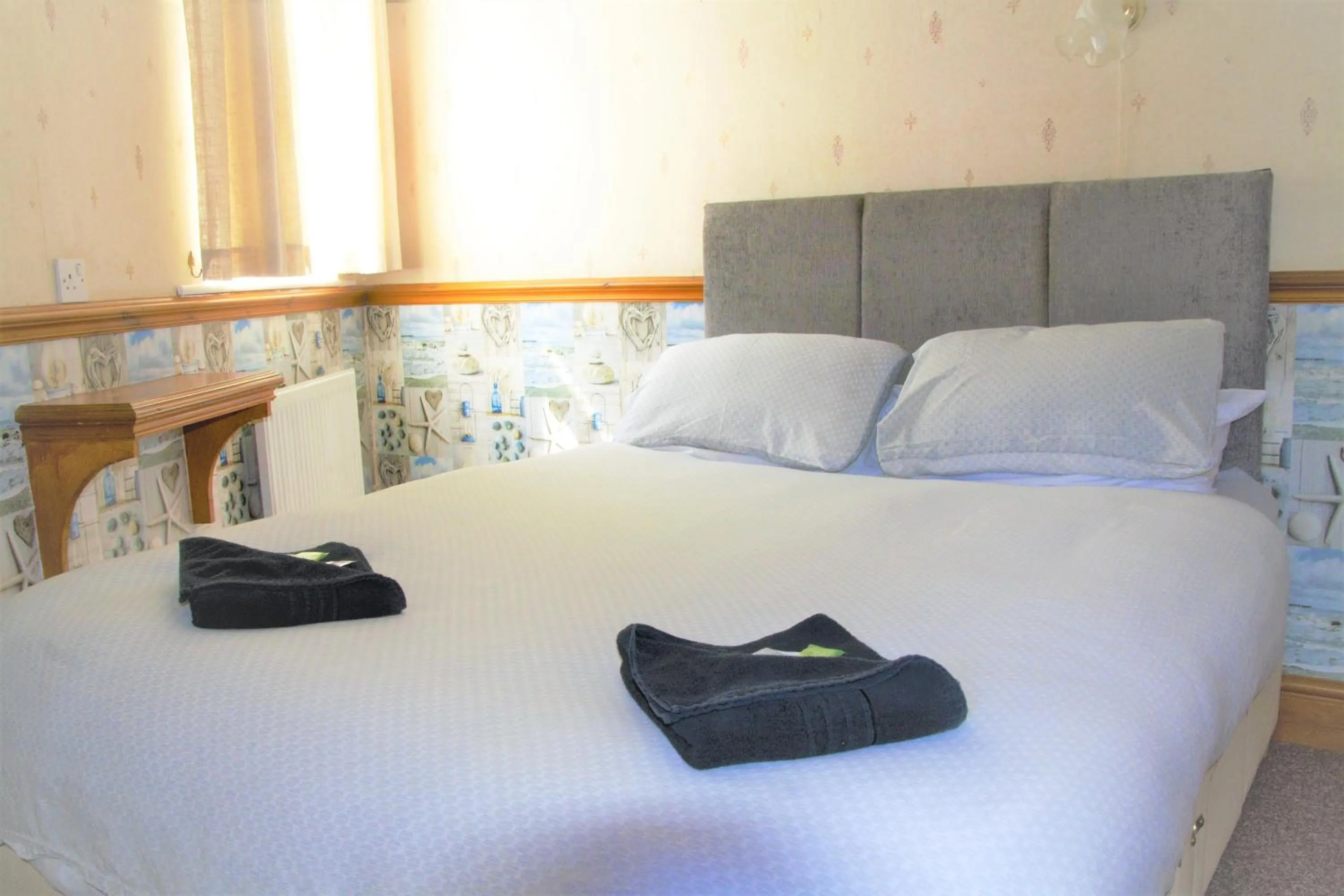 Bed in Pine Lodge Hotel