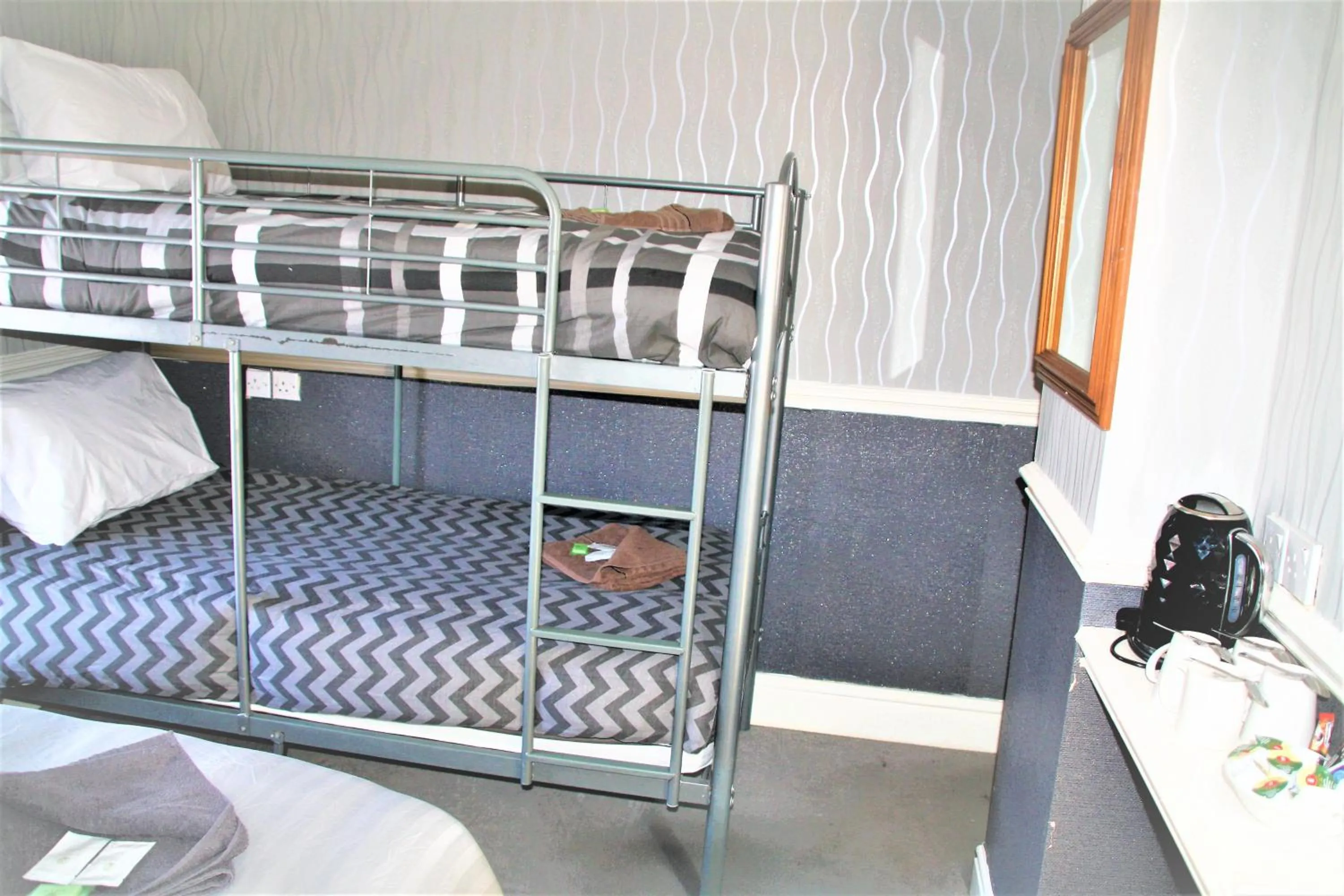 Bed in Pine Lodge Hotel