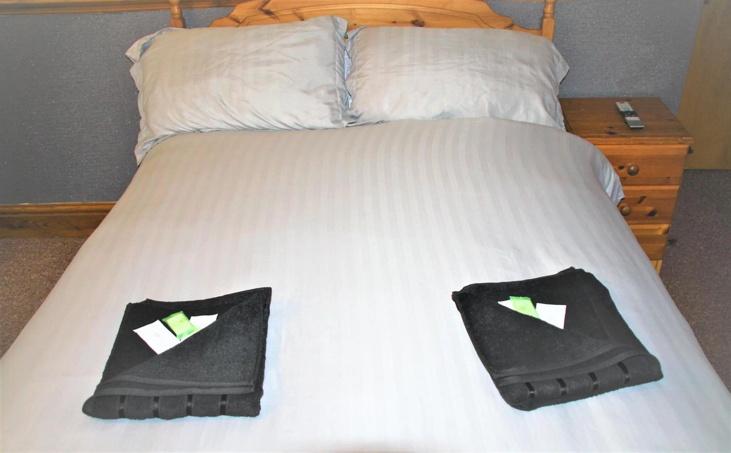 Bed in Pine Lodge Hotel