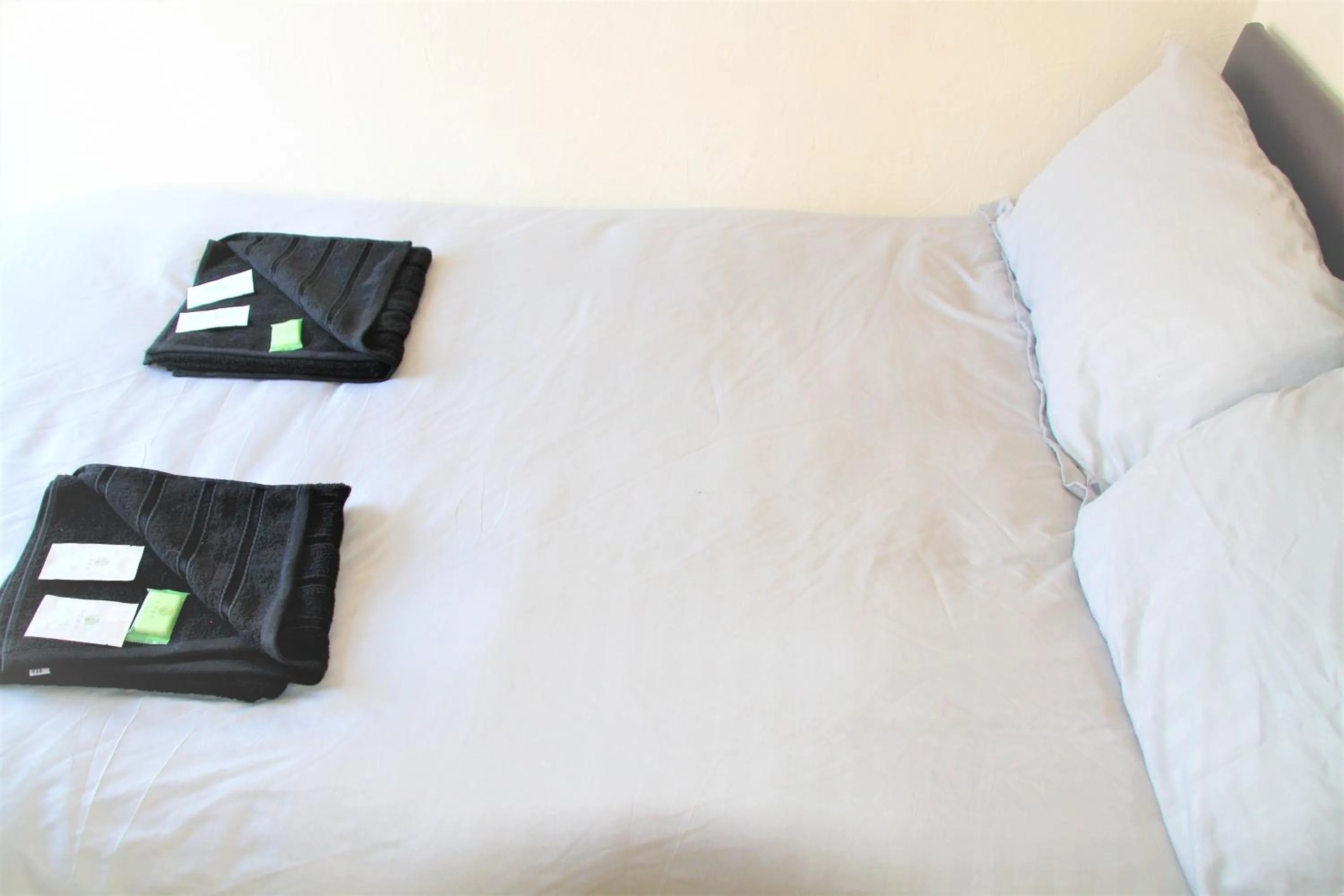 Bed in Pine Lodge Hotel