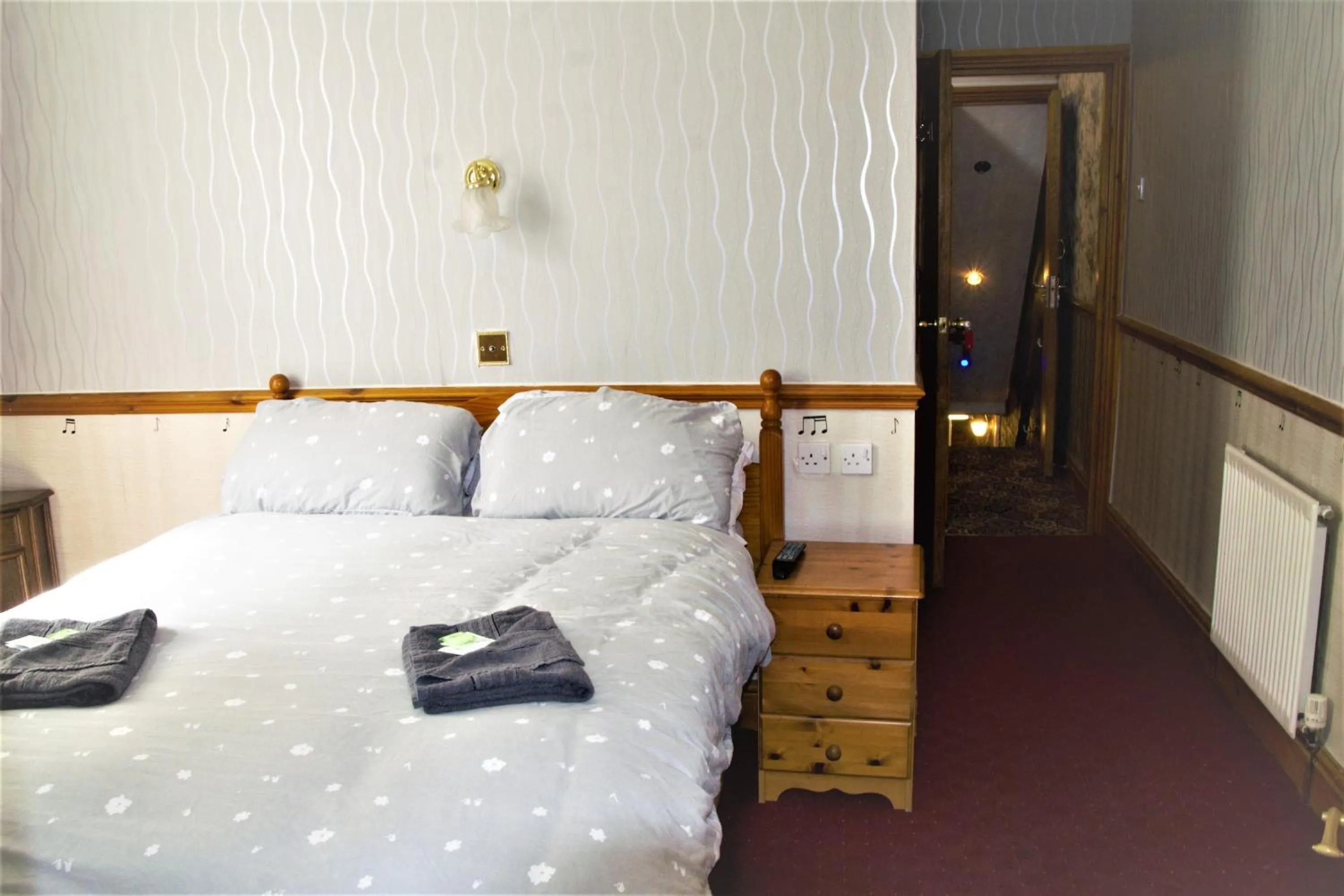 Bed in Pine Lodge Hotel