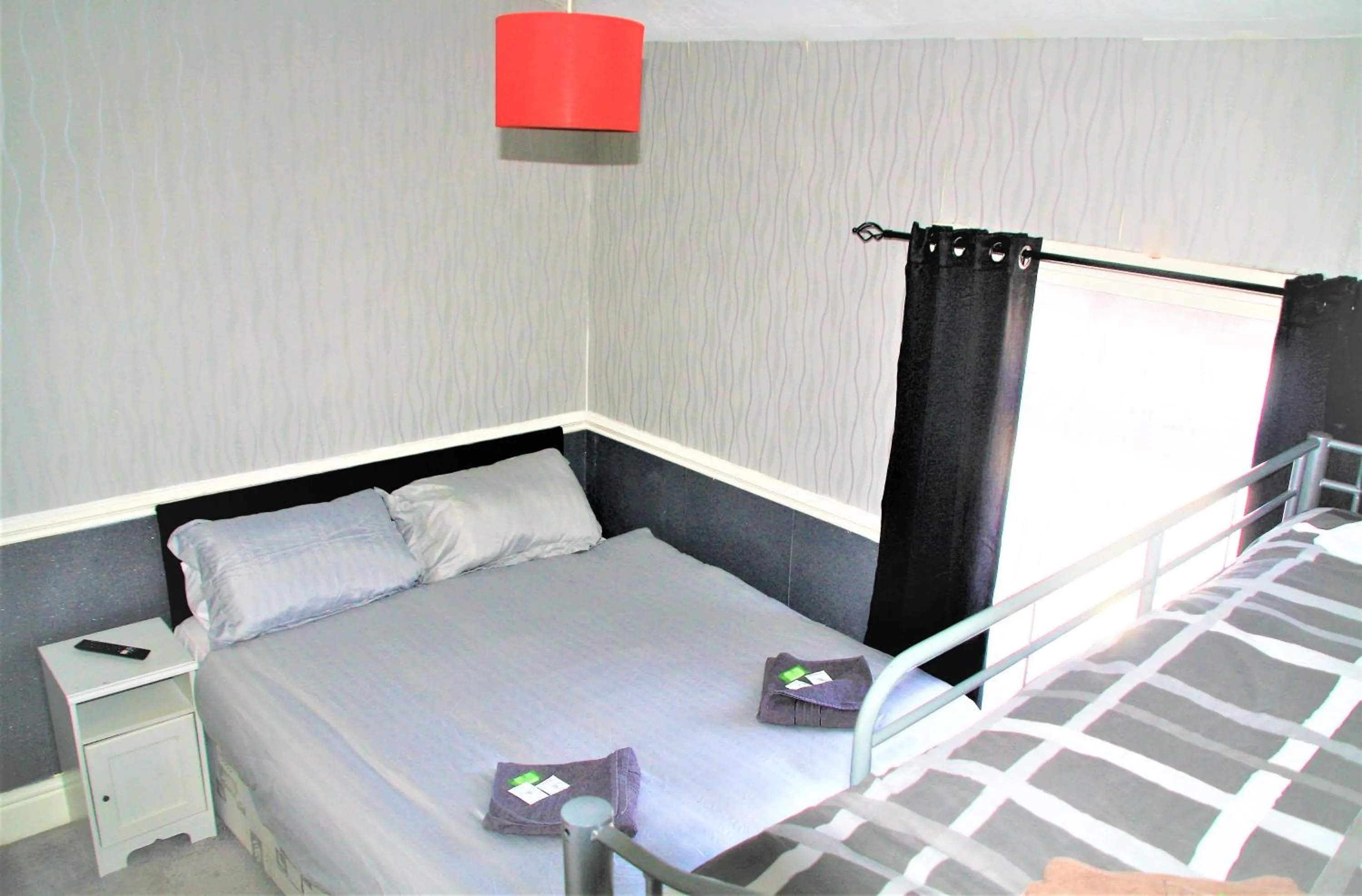 Bed in Pine Lodge Hotel