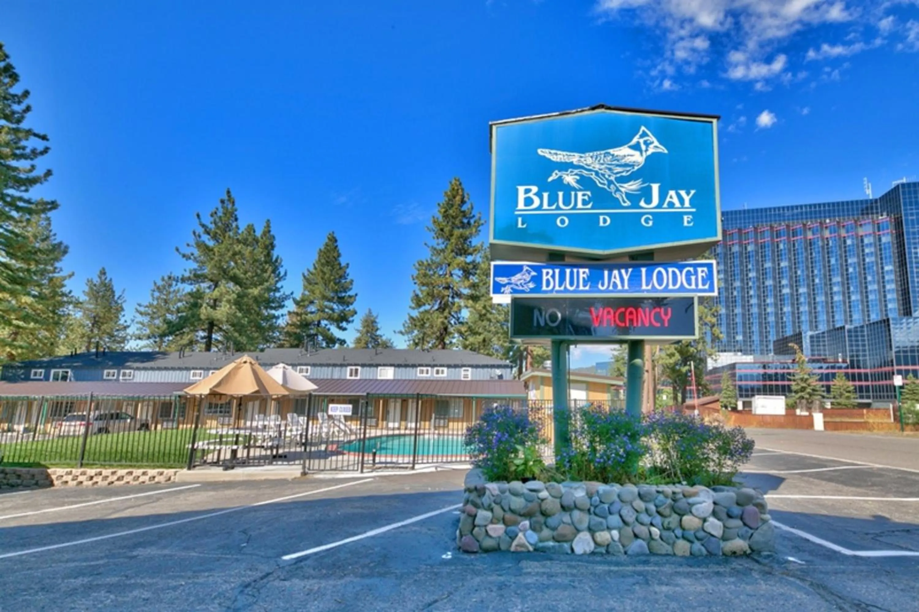 Property logo or sign in Blue Jay Lodge
