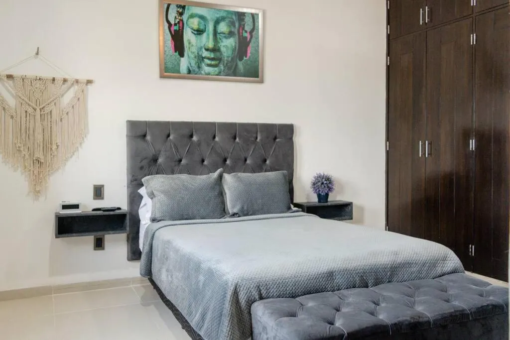 Bed in Hermoso Penthouse Rooftop con alberca