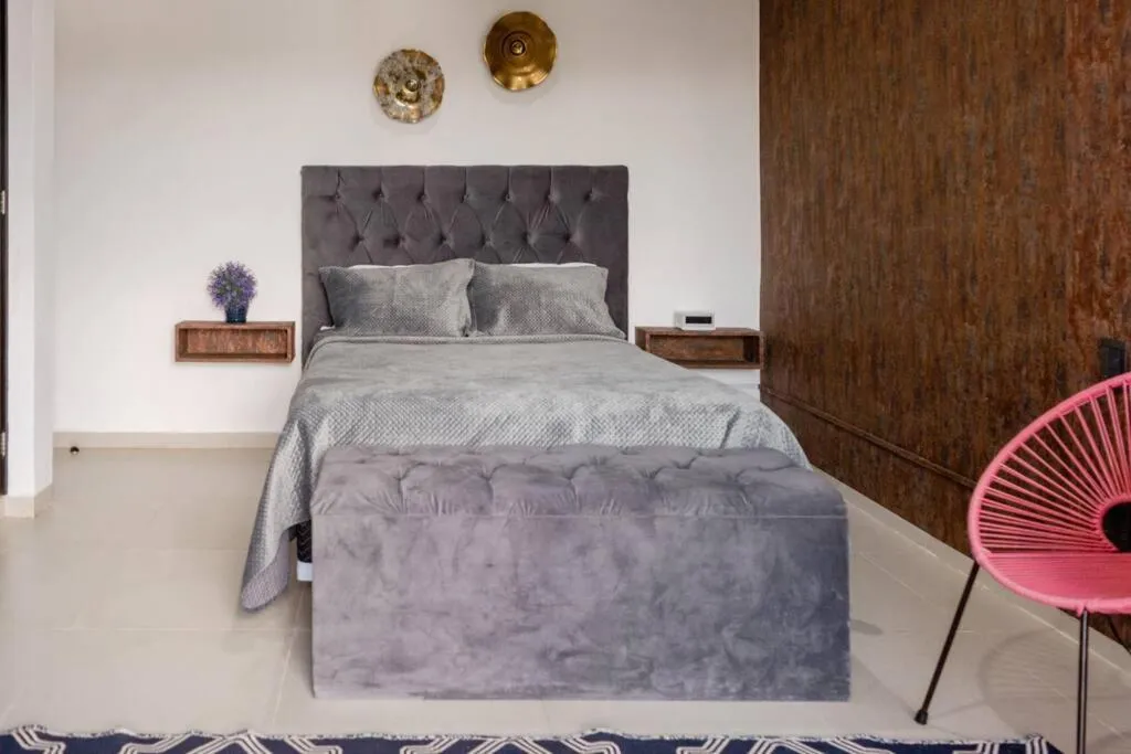 Bed in Hermoso Penthouse Rooftop con alberca