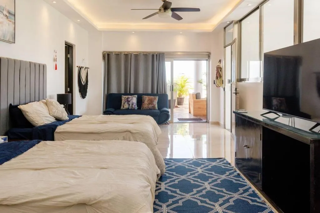 Bed in Hermoso Penthouse Rooftop con alberca