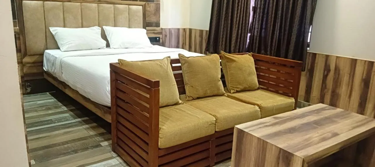 Photo of the whole room, Bed in Laxman Residency