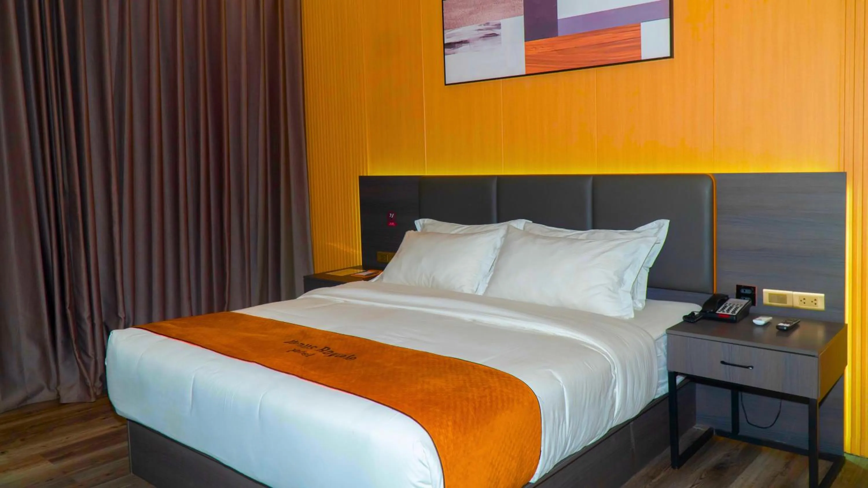 Bed in Venus Royale Hotel