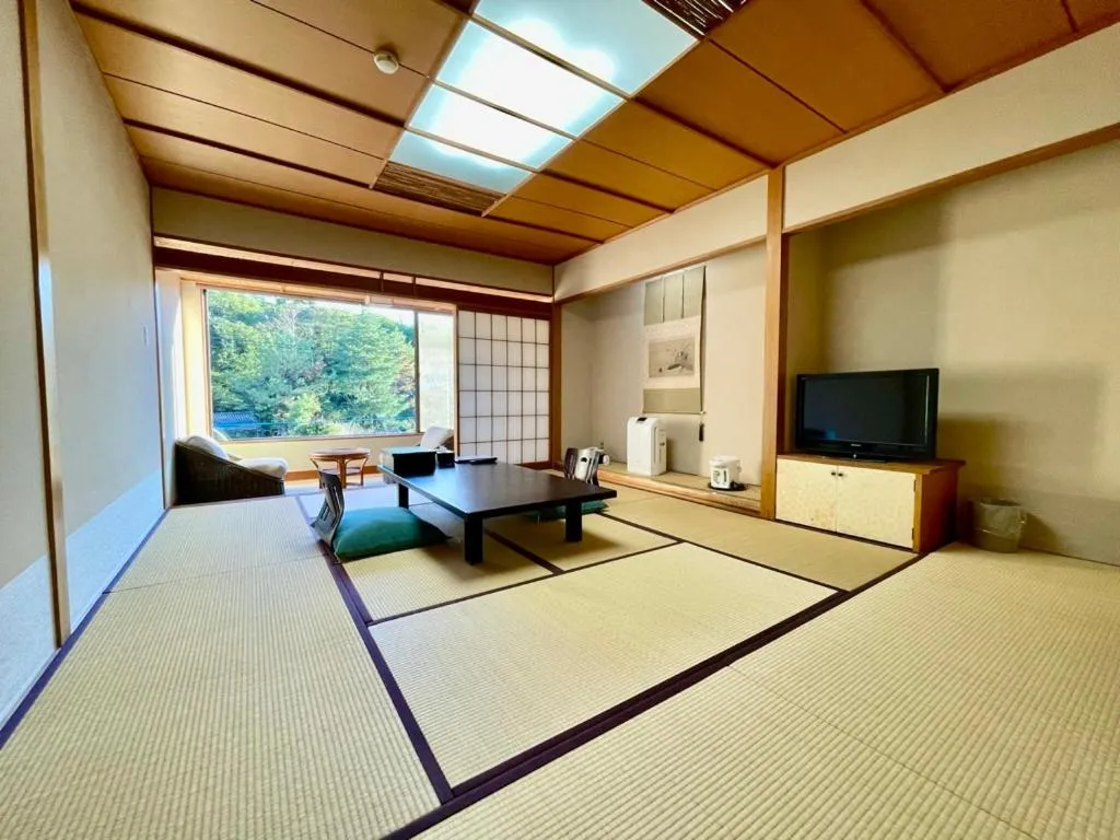 Living room, Bed in Izu Katsura no Izumi Onsen