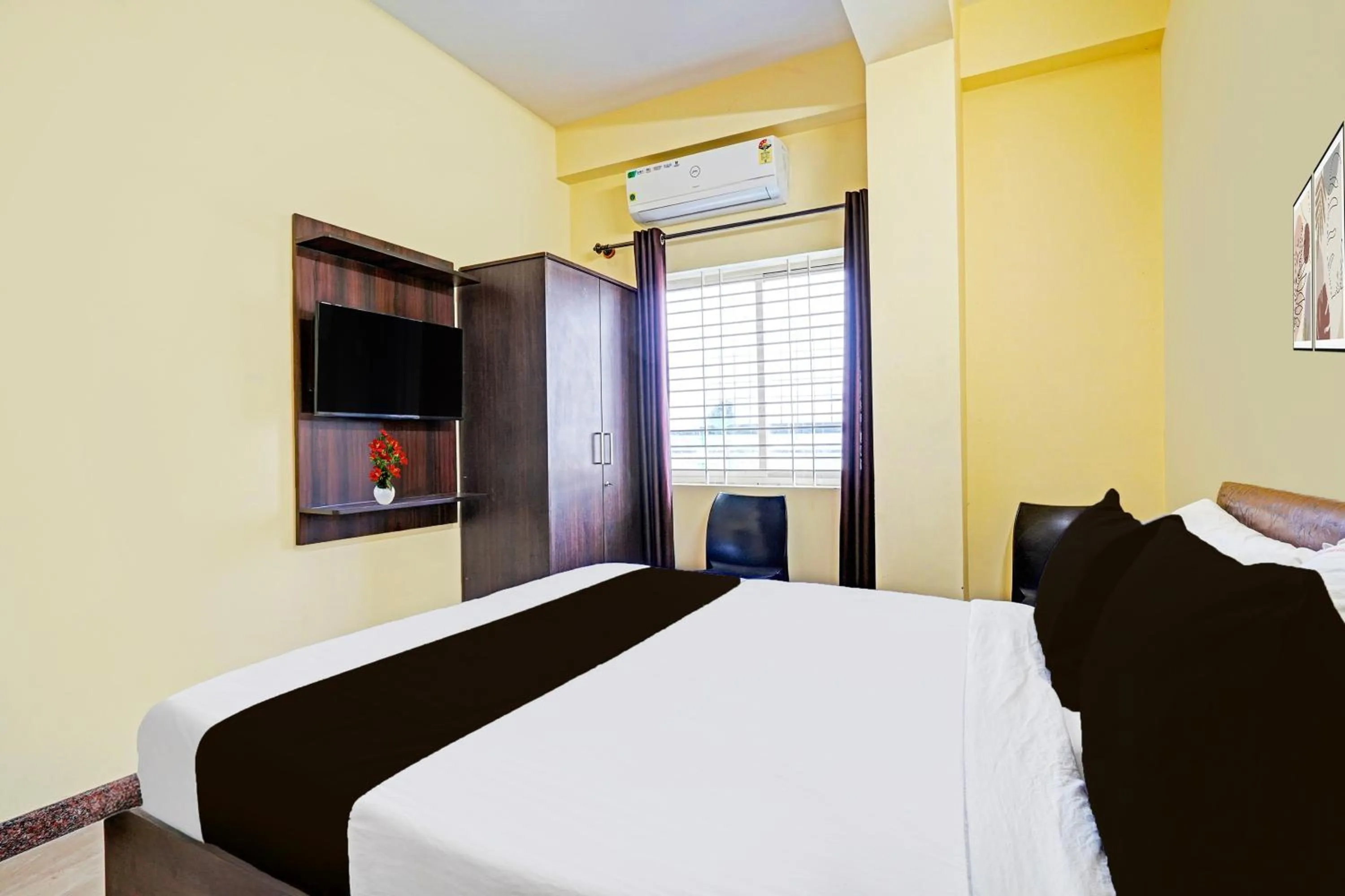 Bedroom, Bed in Super Hotel O Srigandhakavalu formerly Chamundeshwari Lodging