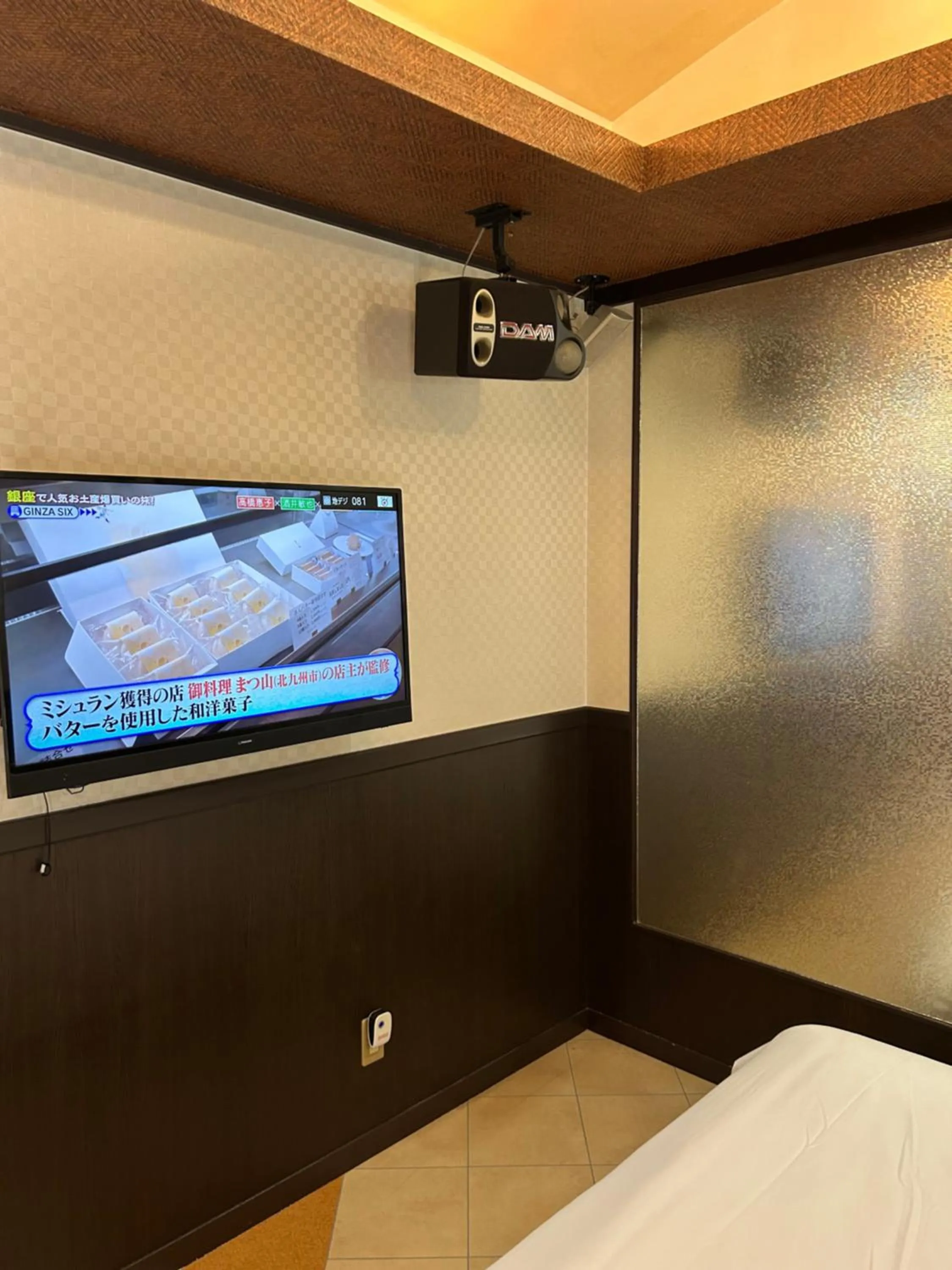 Bed in Hotel Takao Asile