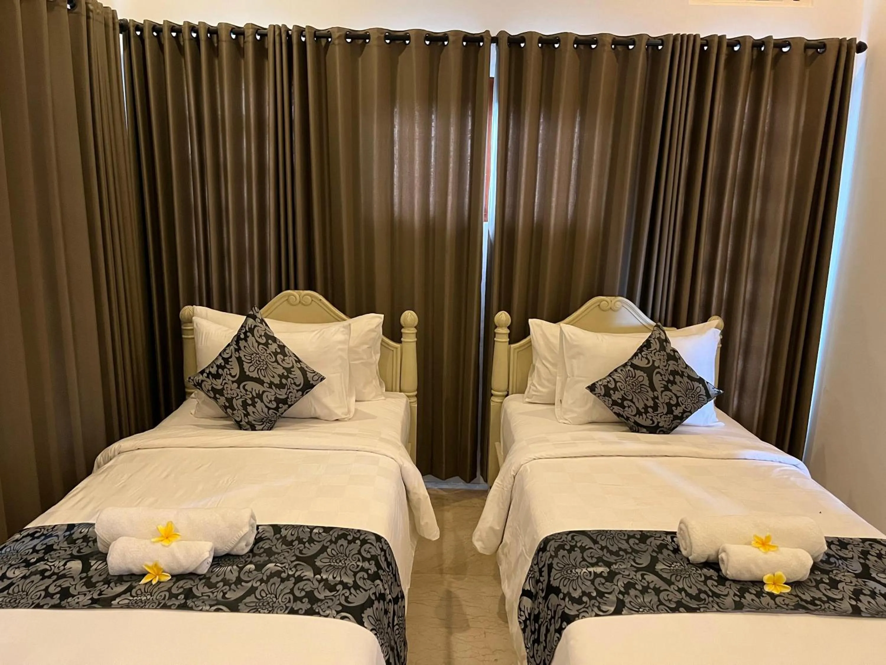 Bed in Arbathu Villa Ubud