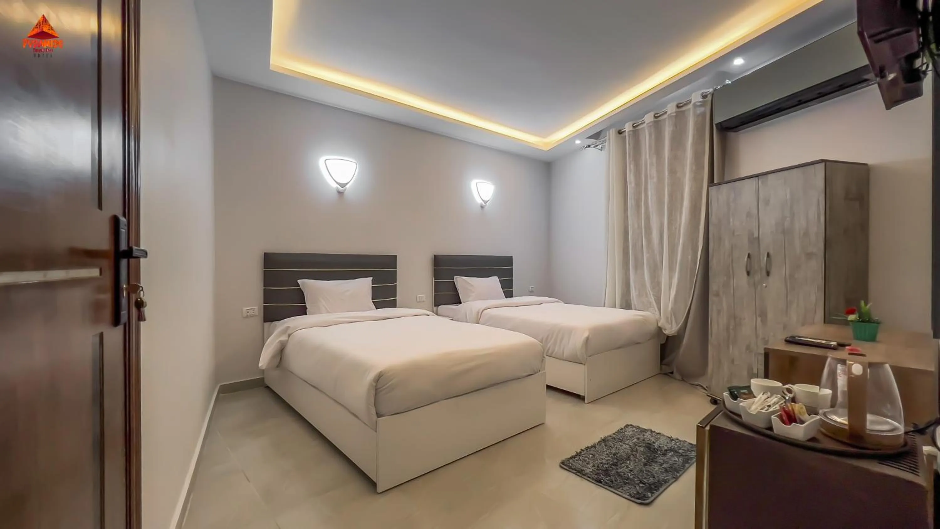 Bed in pyramids tower view inn