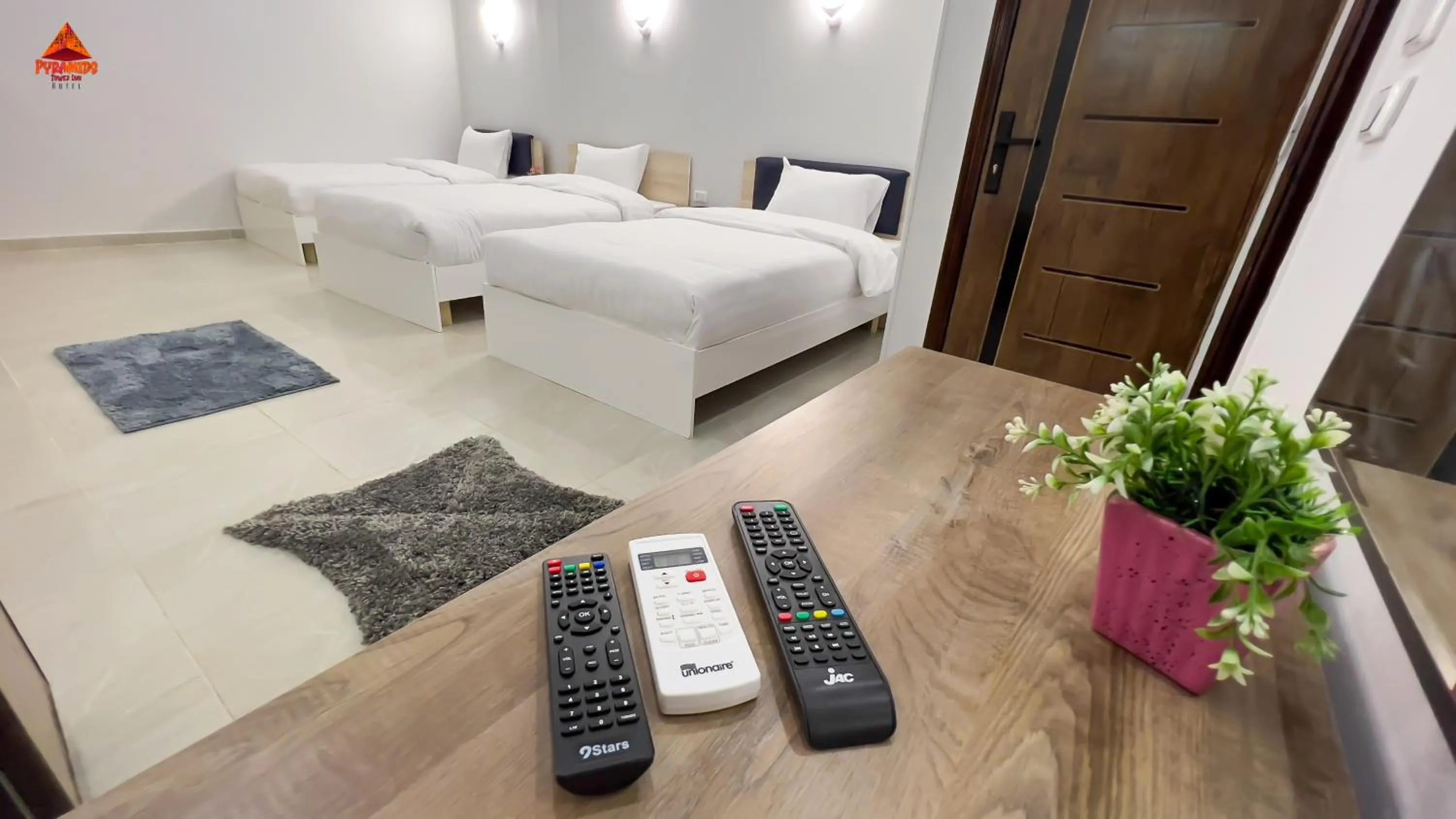 Bed in pyramids tower view inn