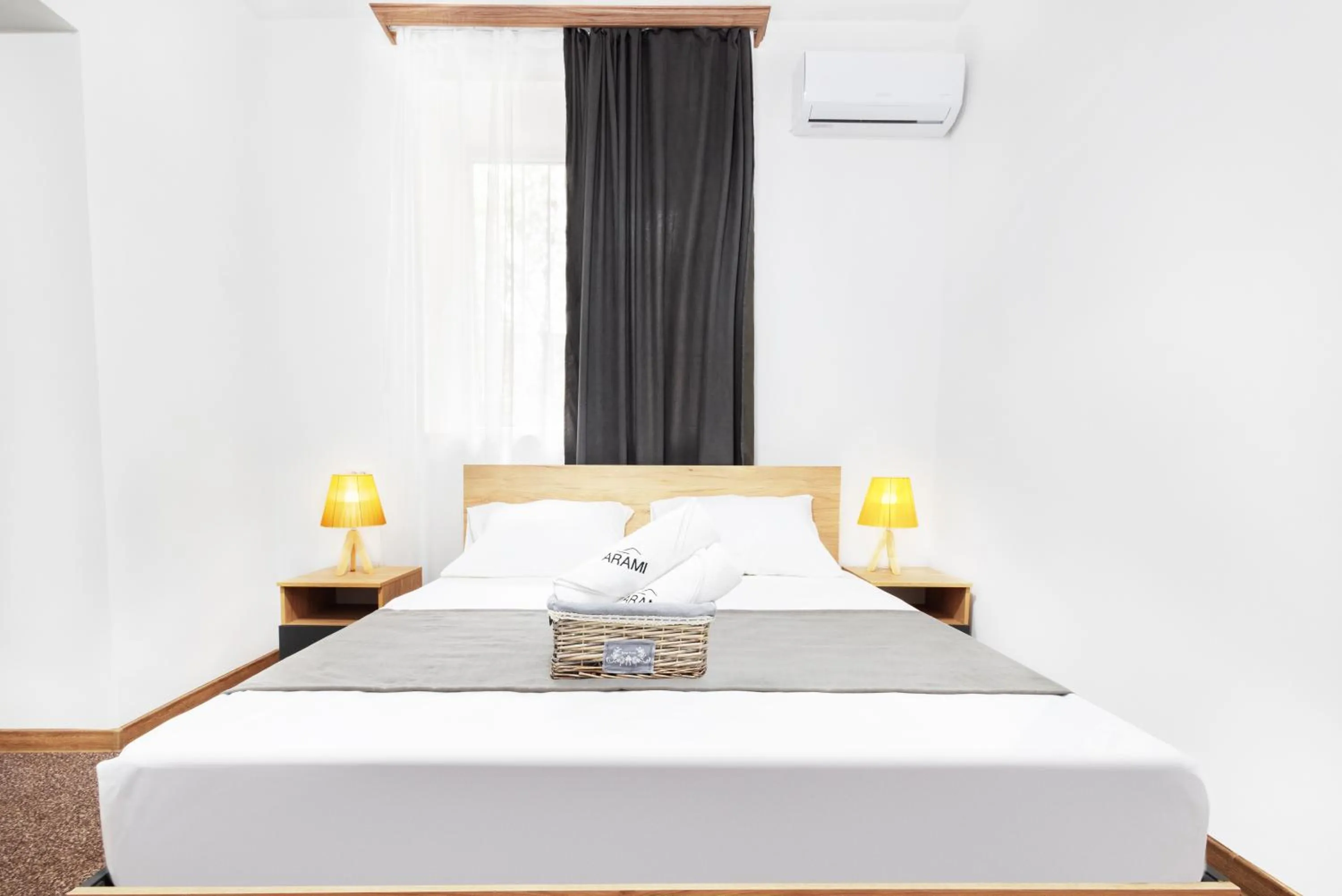 Bed in Hotel Arami by Downtown